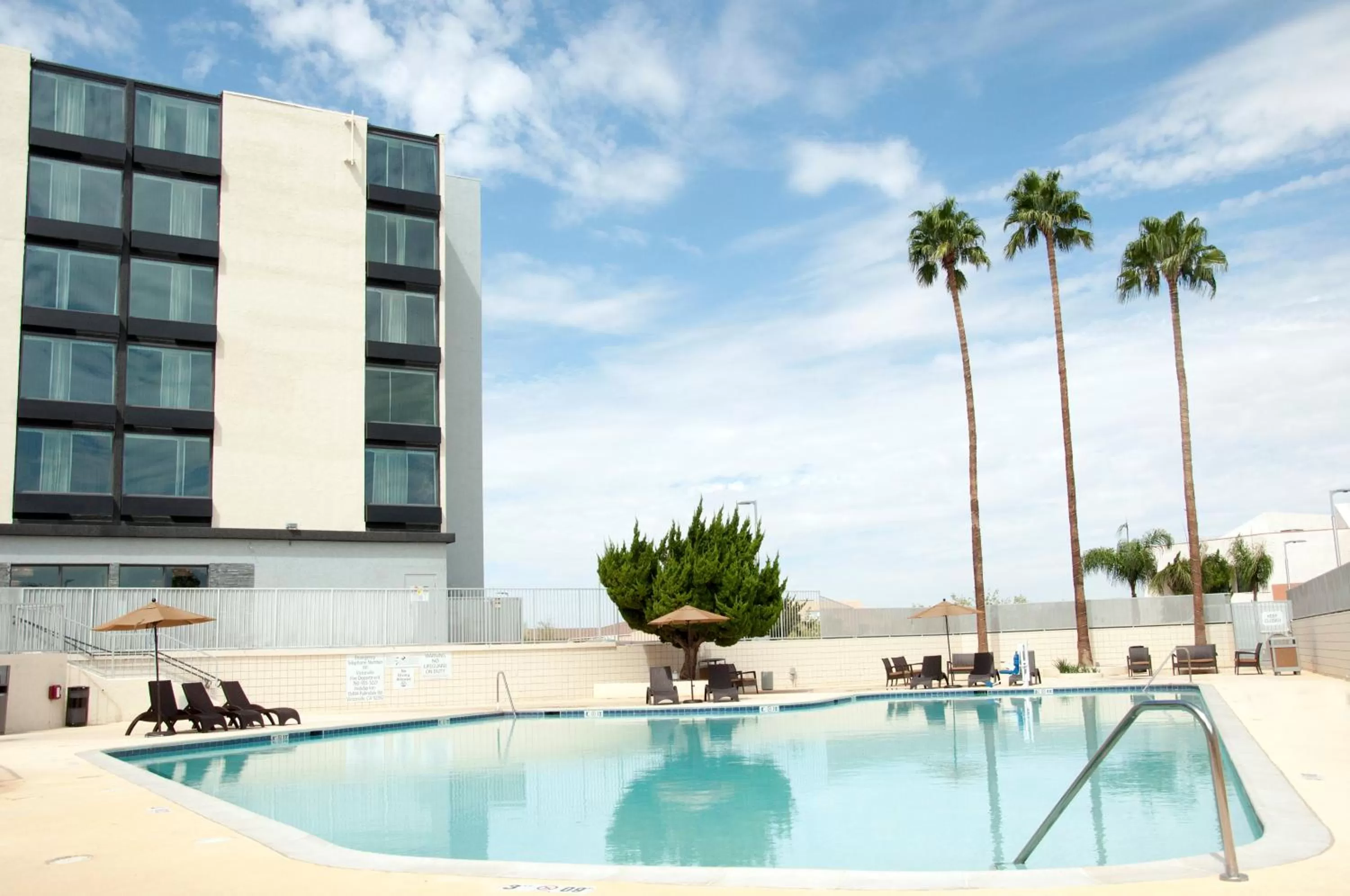 Swimming pool in Holiday Inn Victorville by IHG
