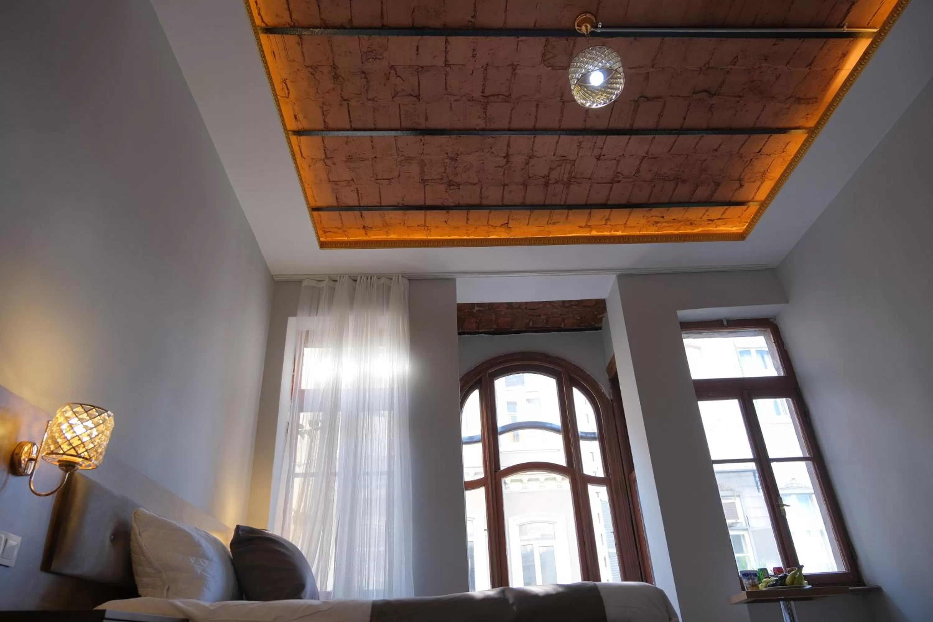 Bed in Adamantides Hotel