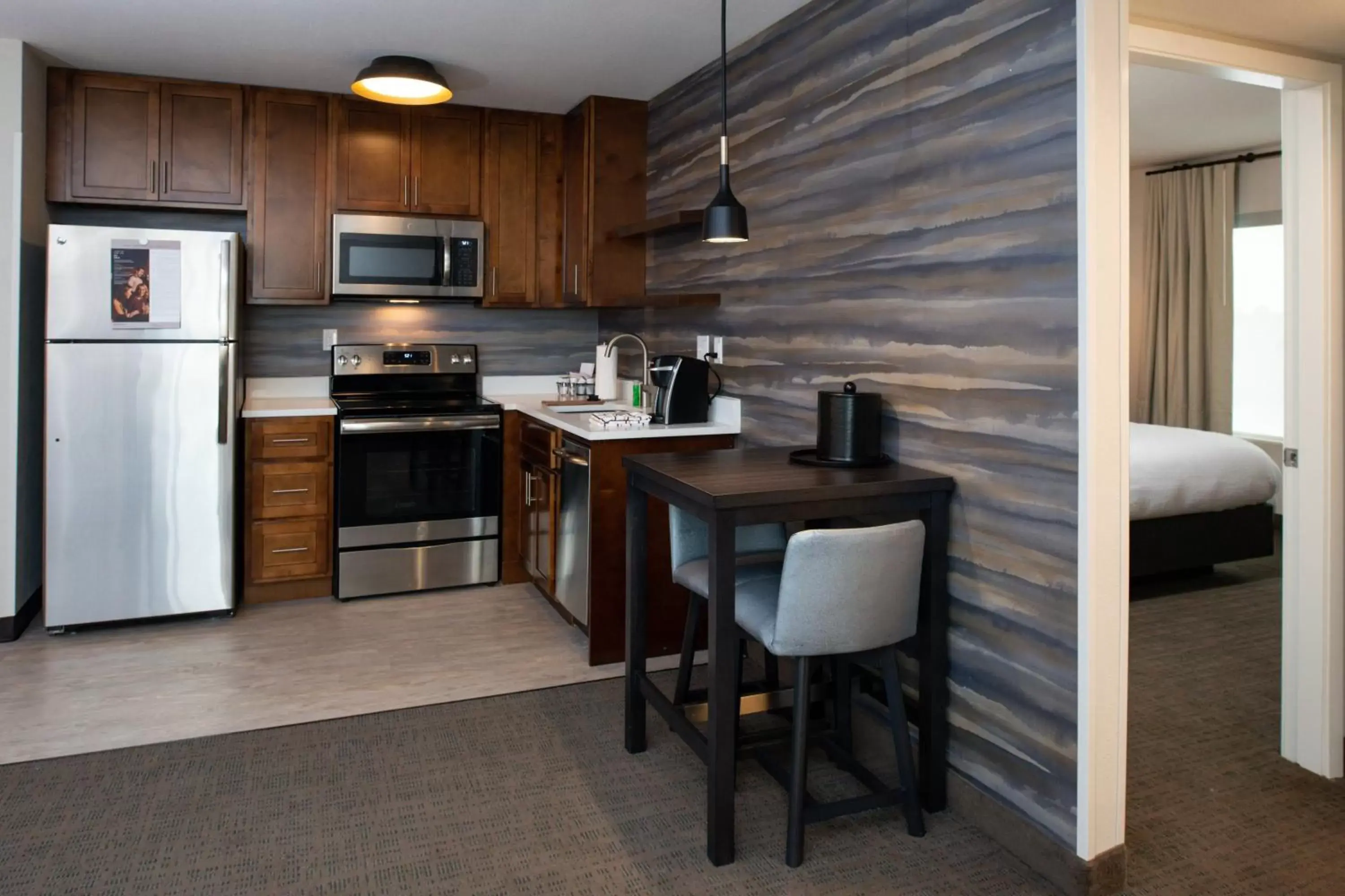 Bedroom, Kitchen/Kitchenette in Residence Inn Visalia