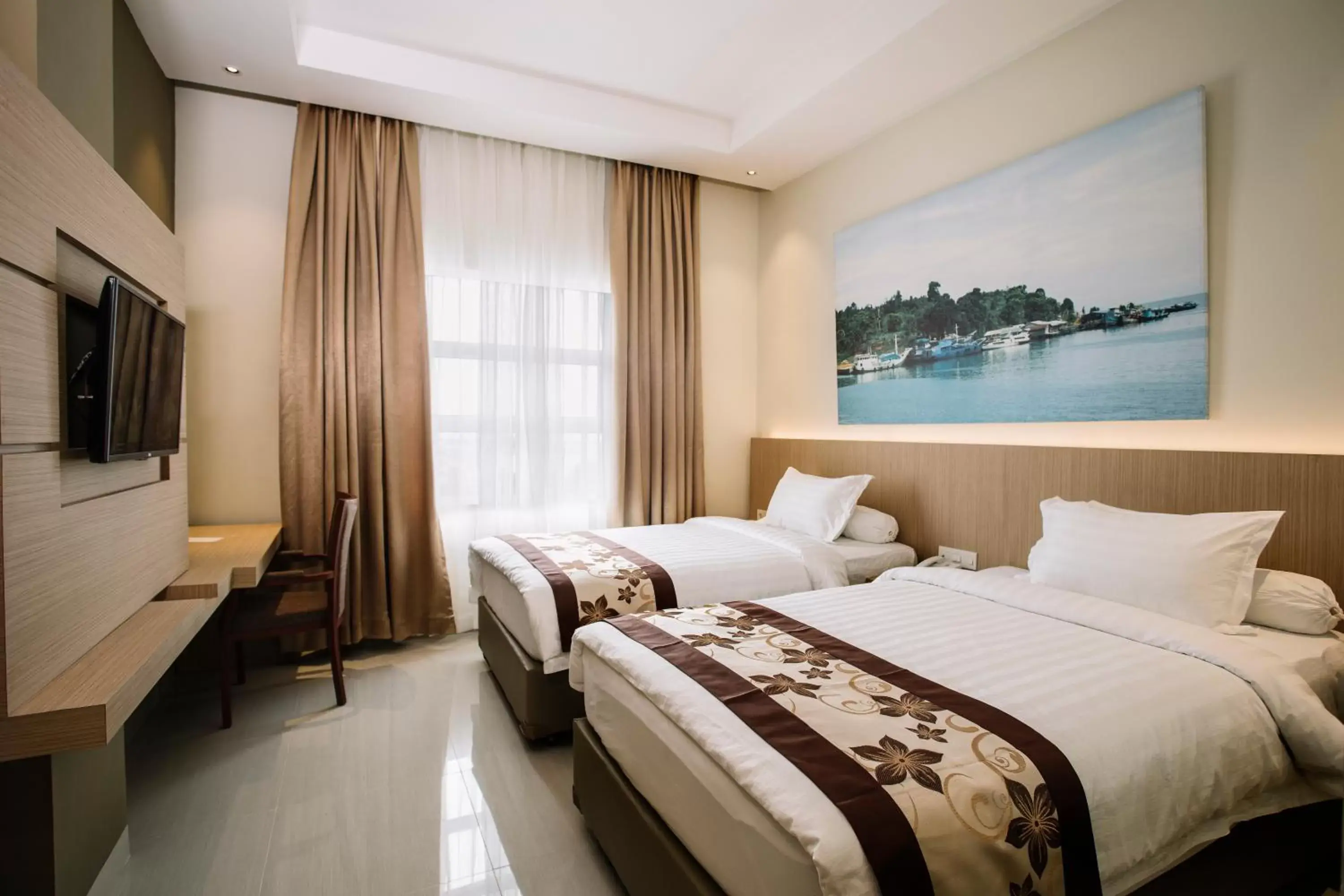 Bedroom in Sahid Batam Center Hotel and Convention Bedroom in Sahid Batam Center Hotel and Convention