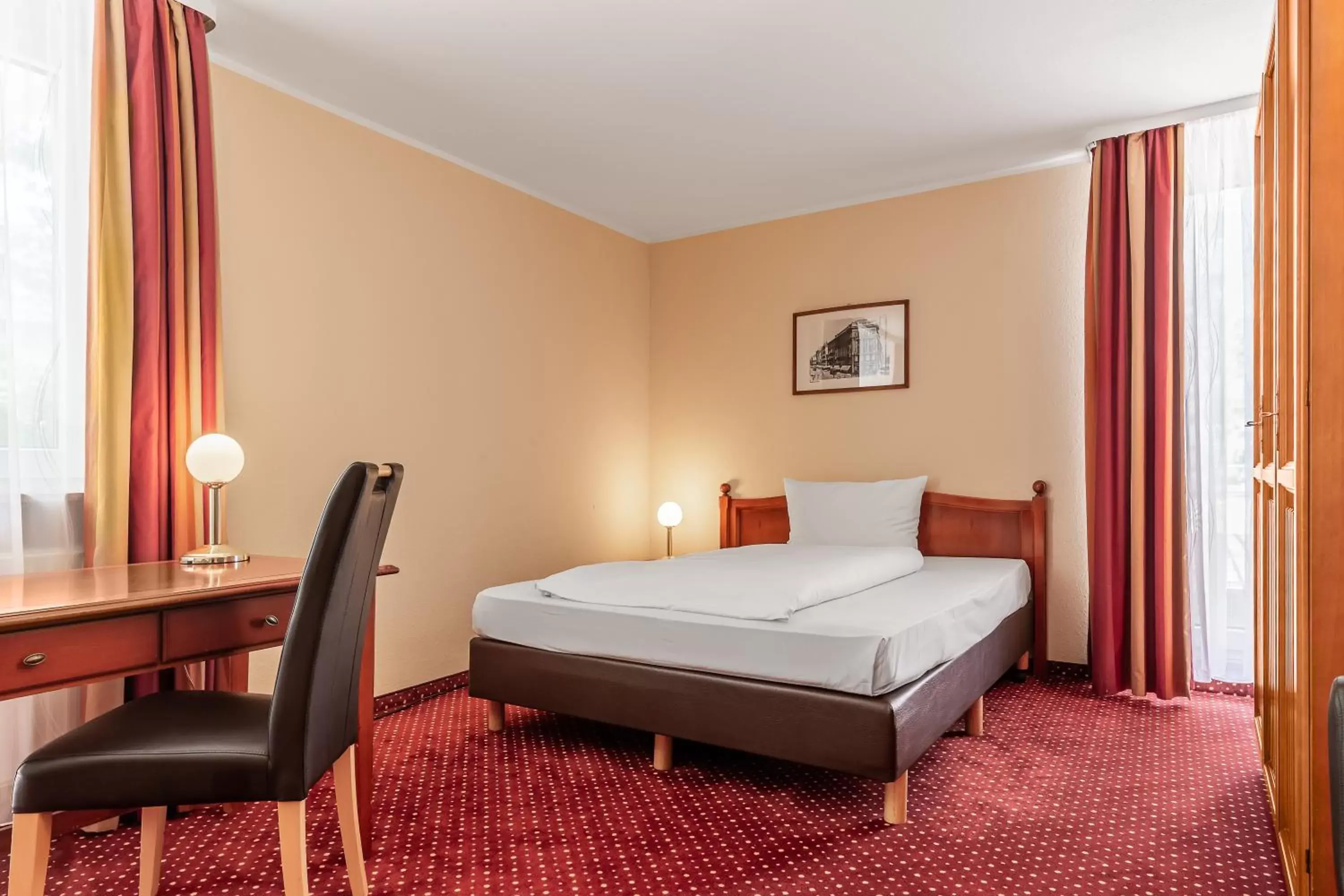 Bed in AZIMUT Hotel Nuremberg
