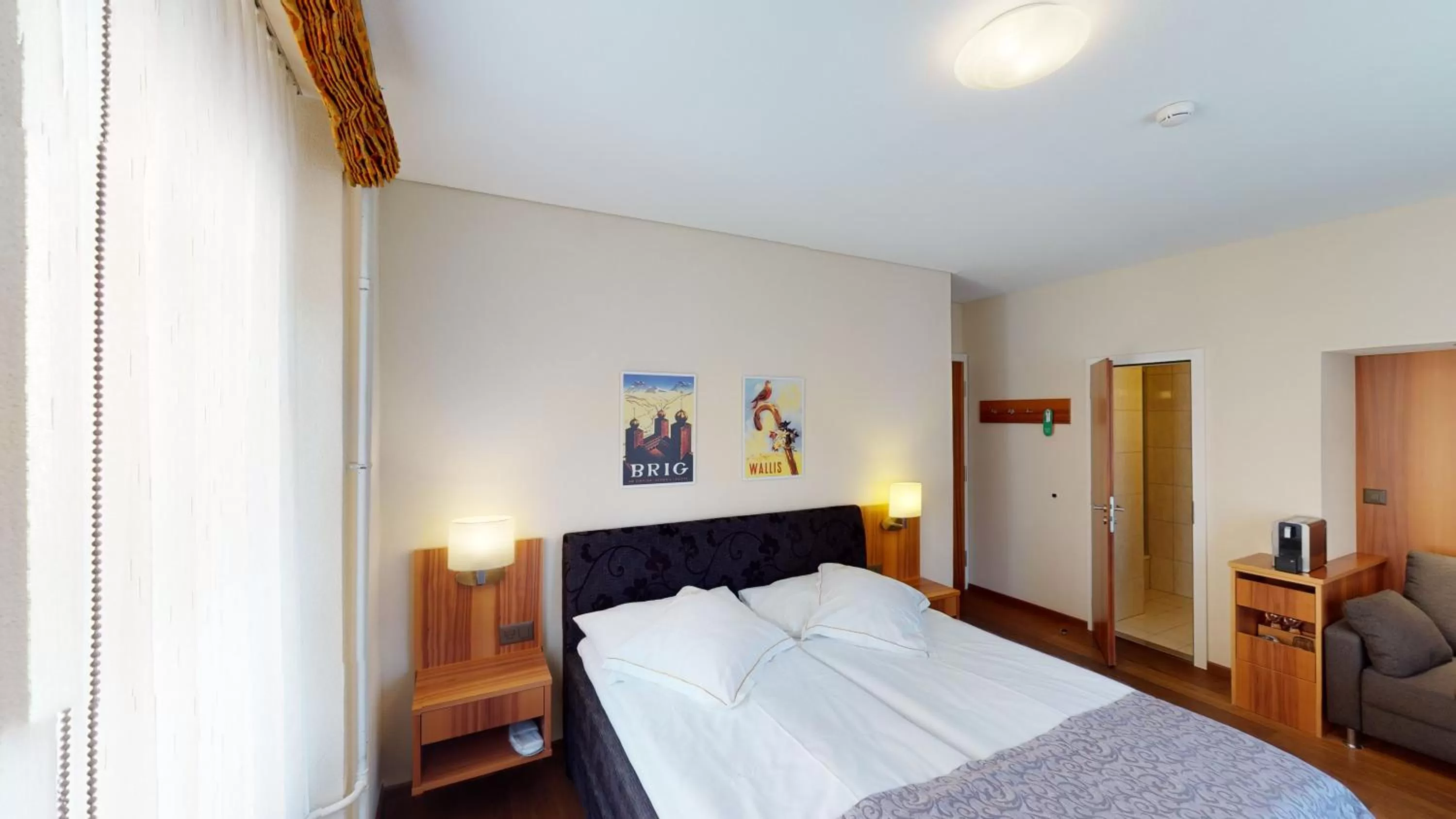 Bed in Hotel Ambassador