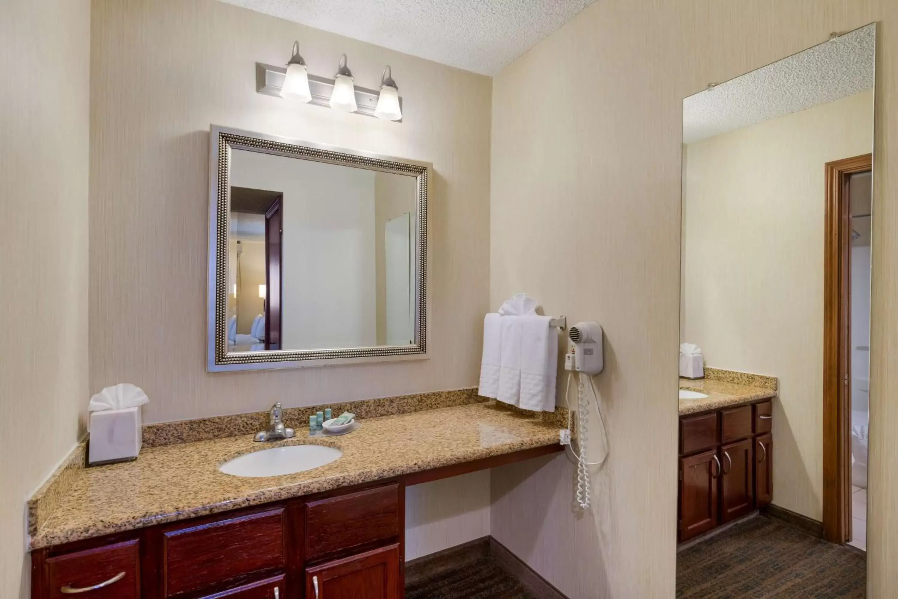 Bathroom in SenS Suites Livermore; SureStay Collection by Best Western