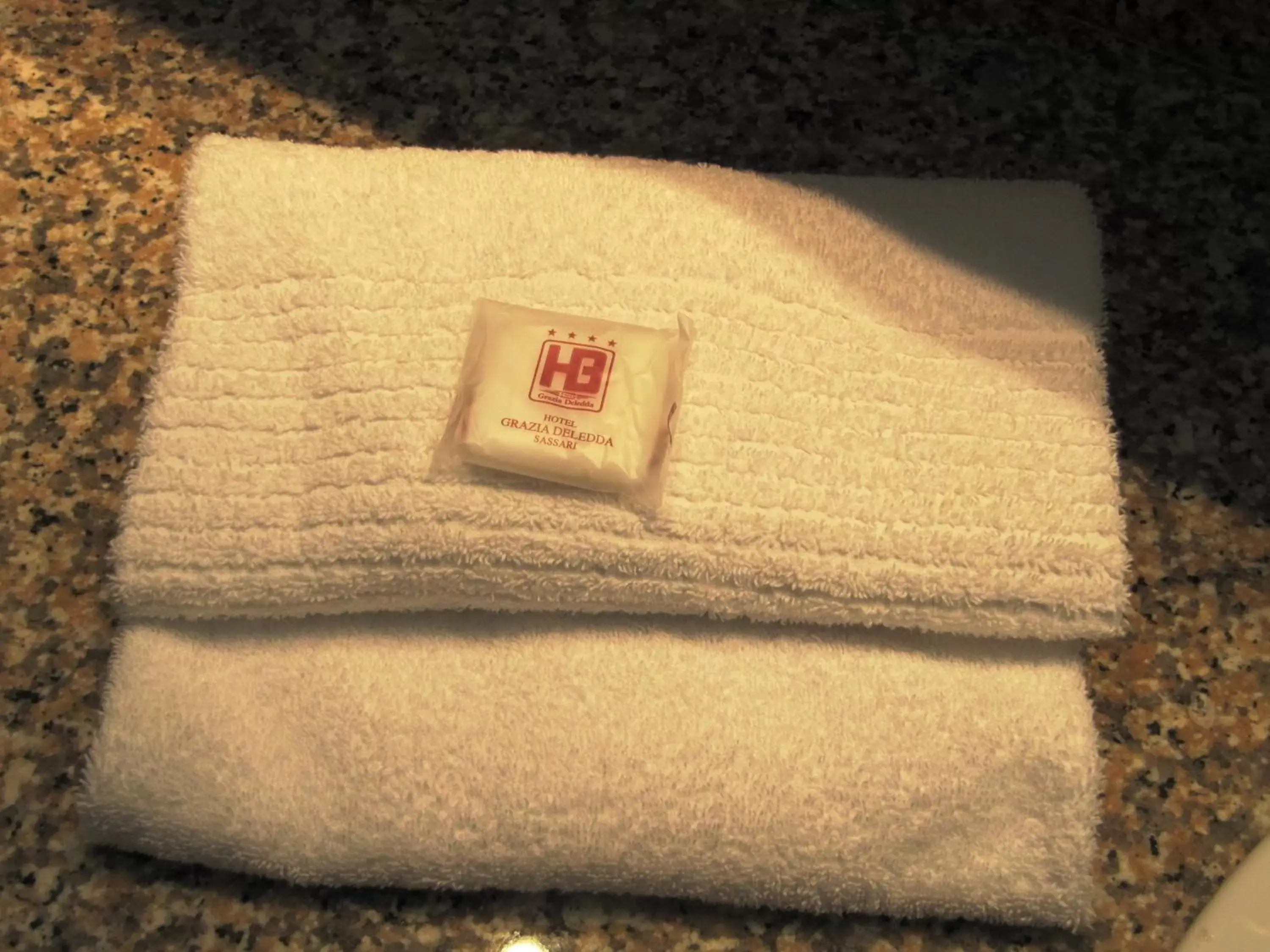 towels, Bed in Hotel Grazia Deledda