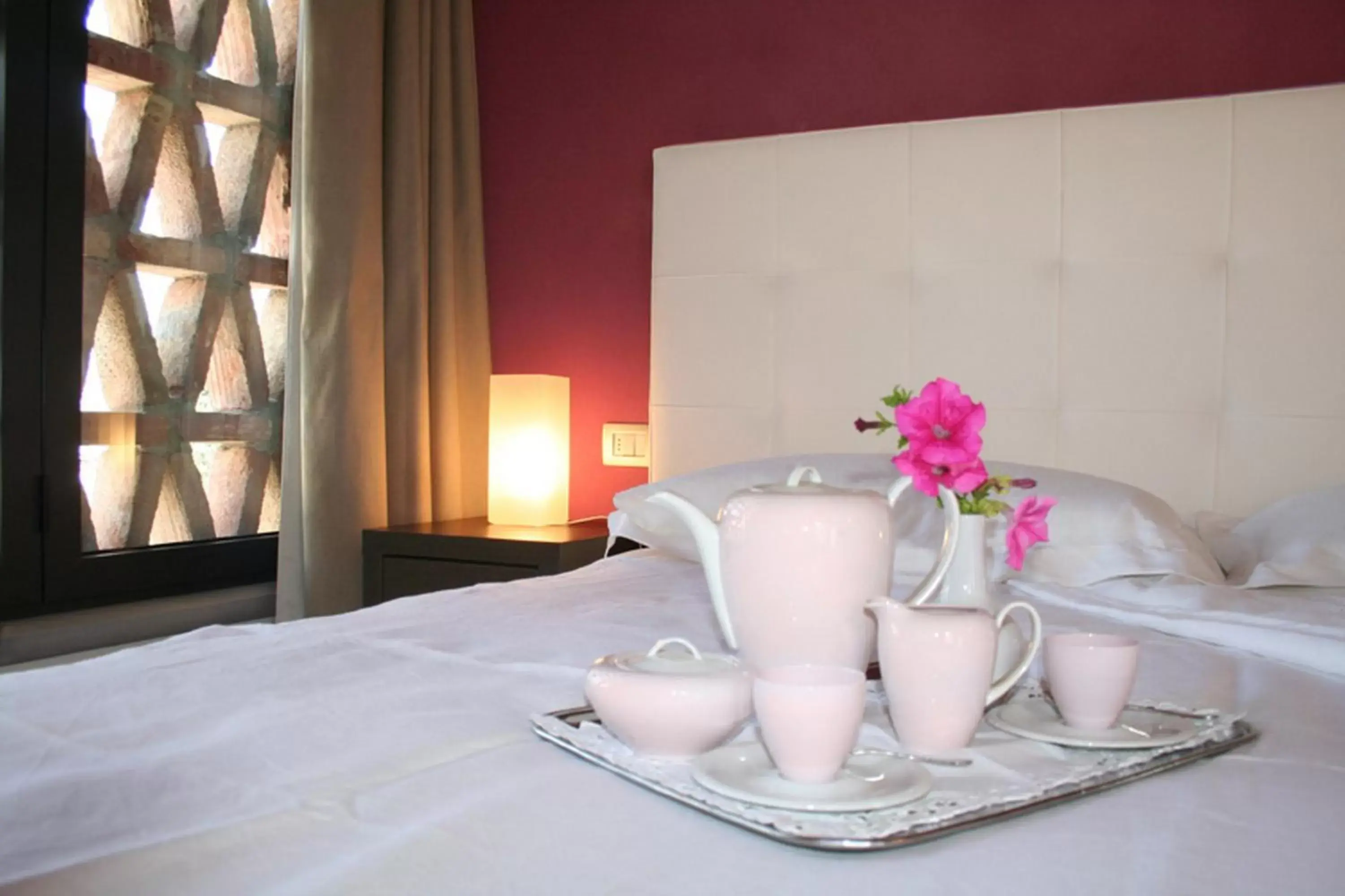 Decorative detail, Bed in Il Poggiolo Delle Rose Bed&Breakfast