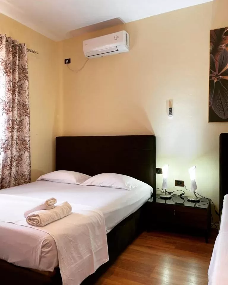 Bed in Hotel Ambasador Garden