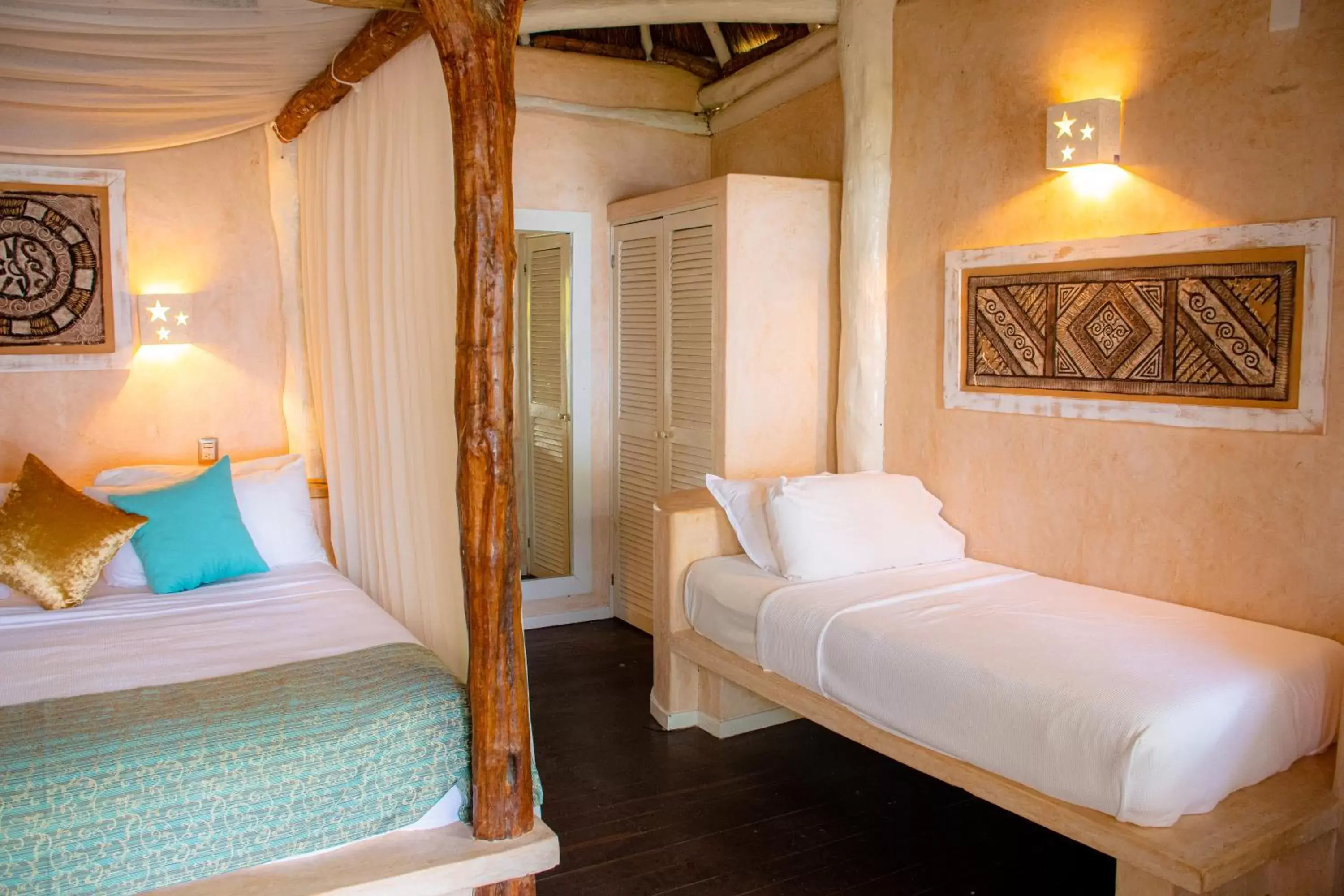 Bed in Villa Las Estrellas Tulum - located at the party zone