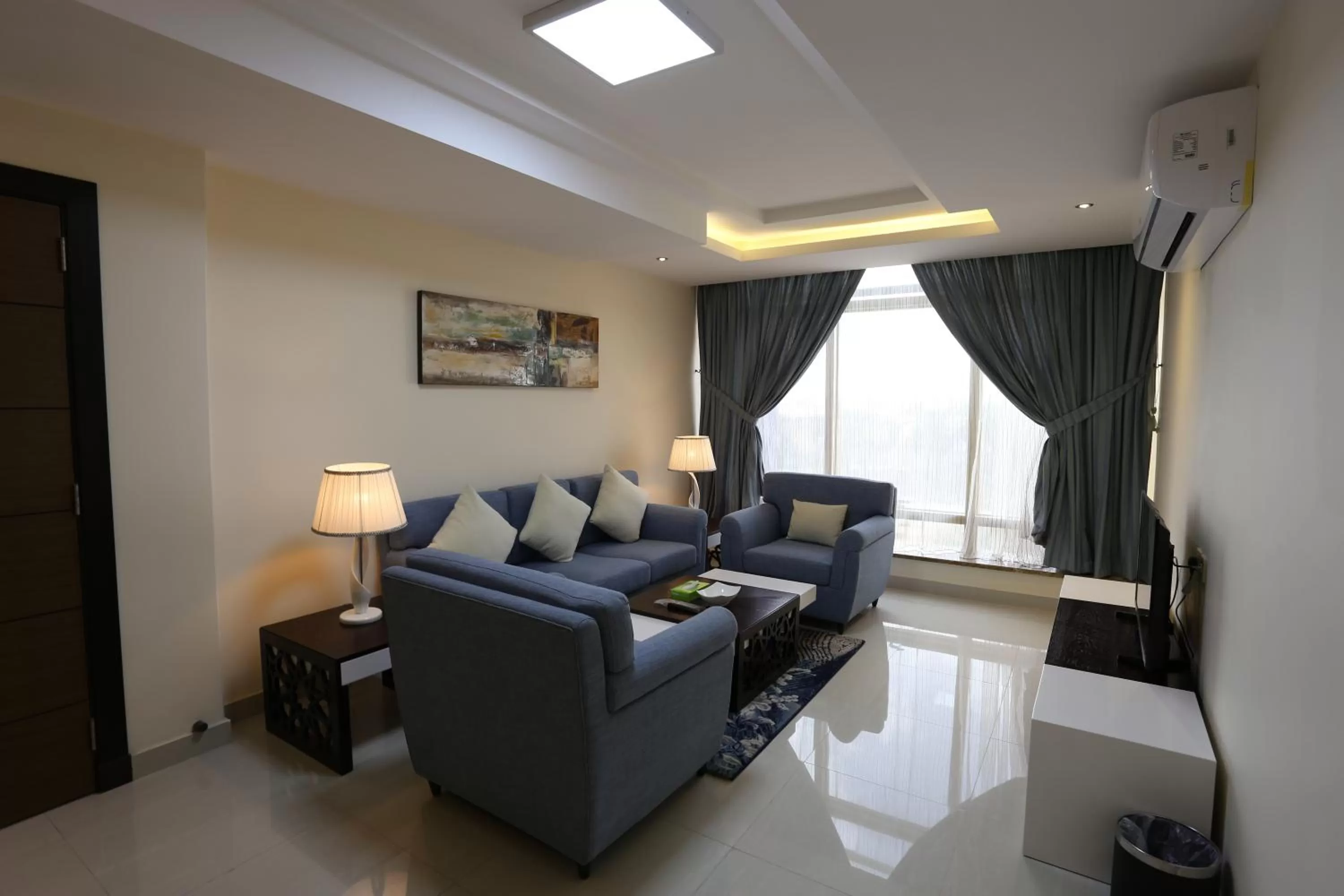 Seating area in Arjaan Altakhassusi Hotel Suites