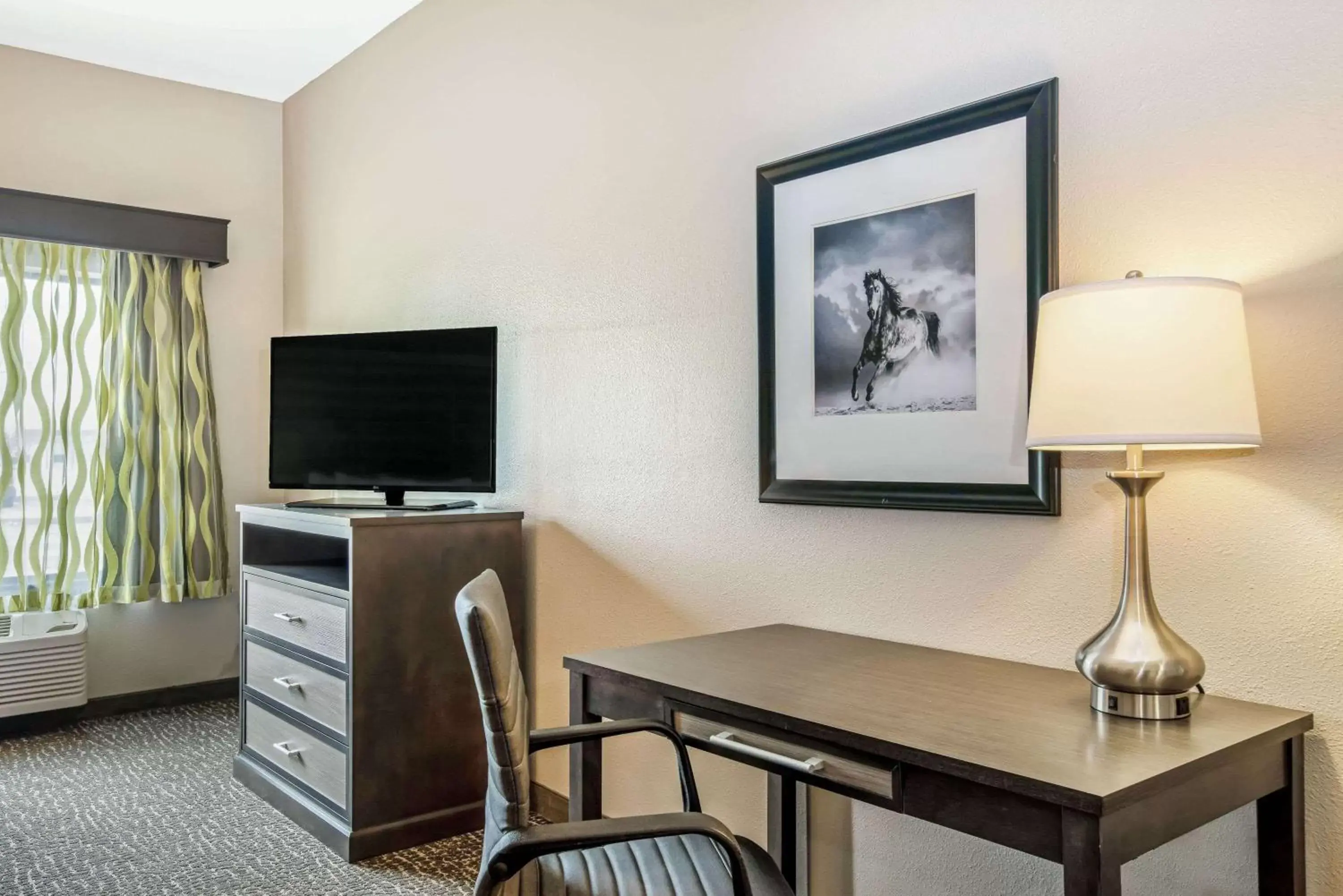 Photo of the whole room, TV/Entertainment Center in La Quinta by Wyndham Kearney