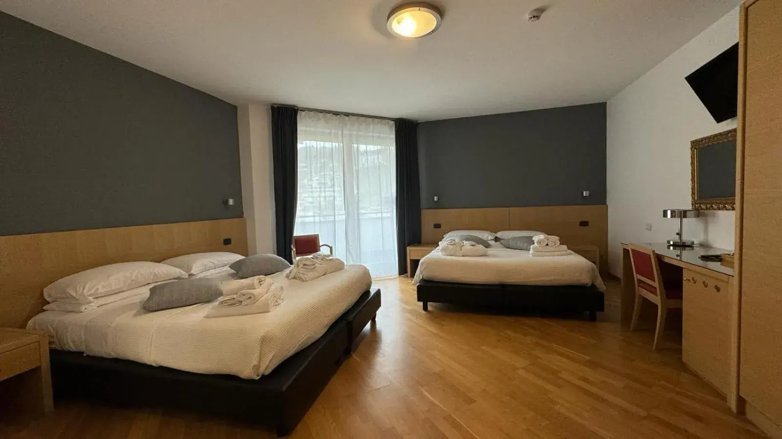 Bed in Hotel Oasi Wellness & Spa