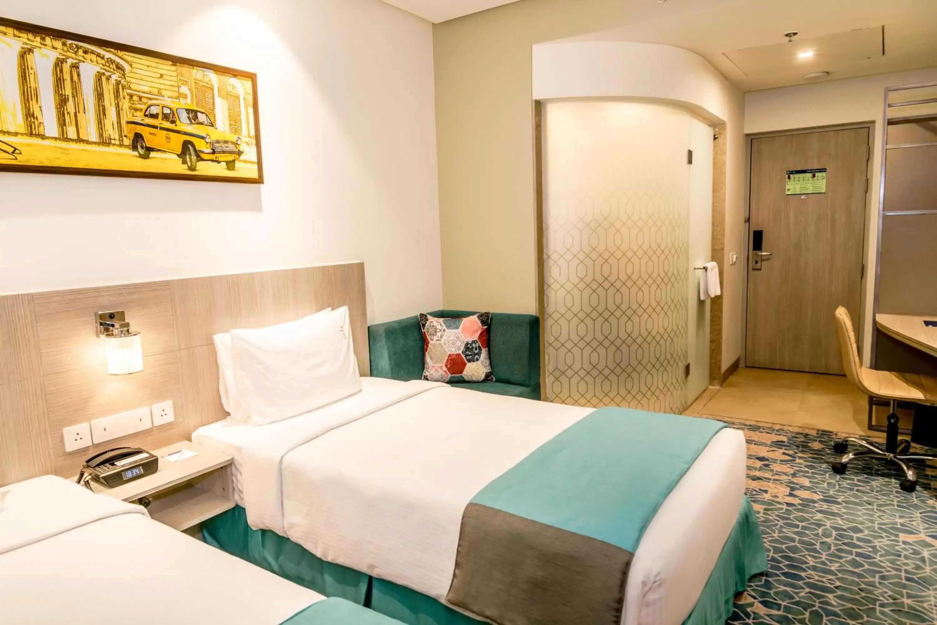 Property building, Bed in Holiday Inn Express Kolkata Airport, an IHG Hotel