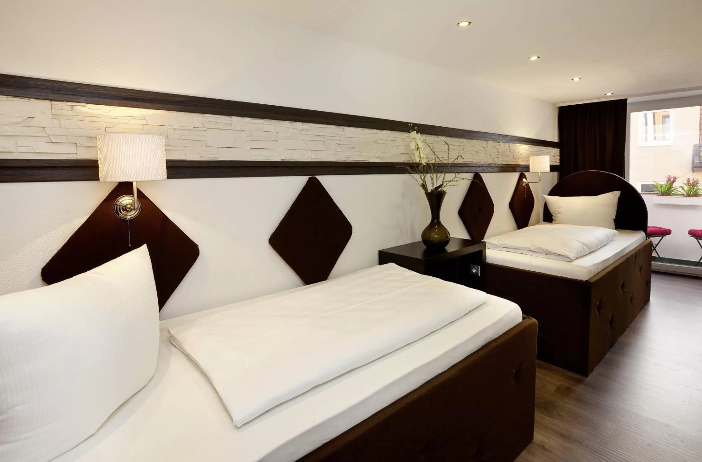 Bed in City Apart Hotel Füssen