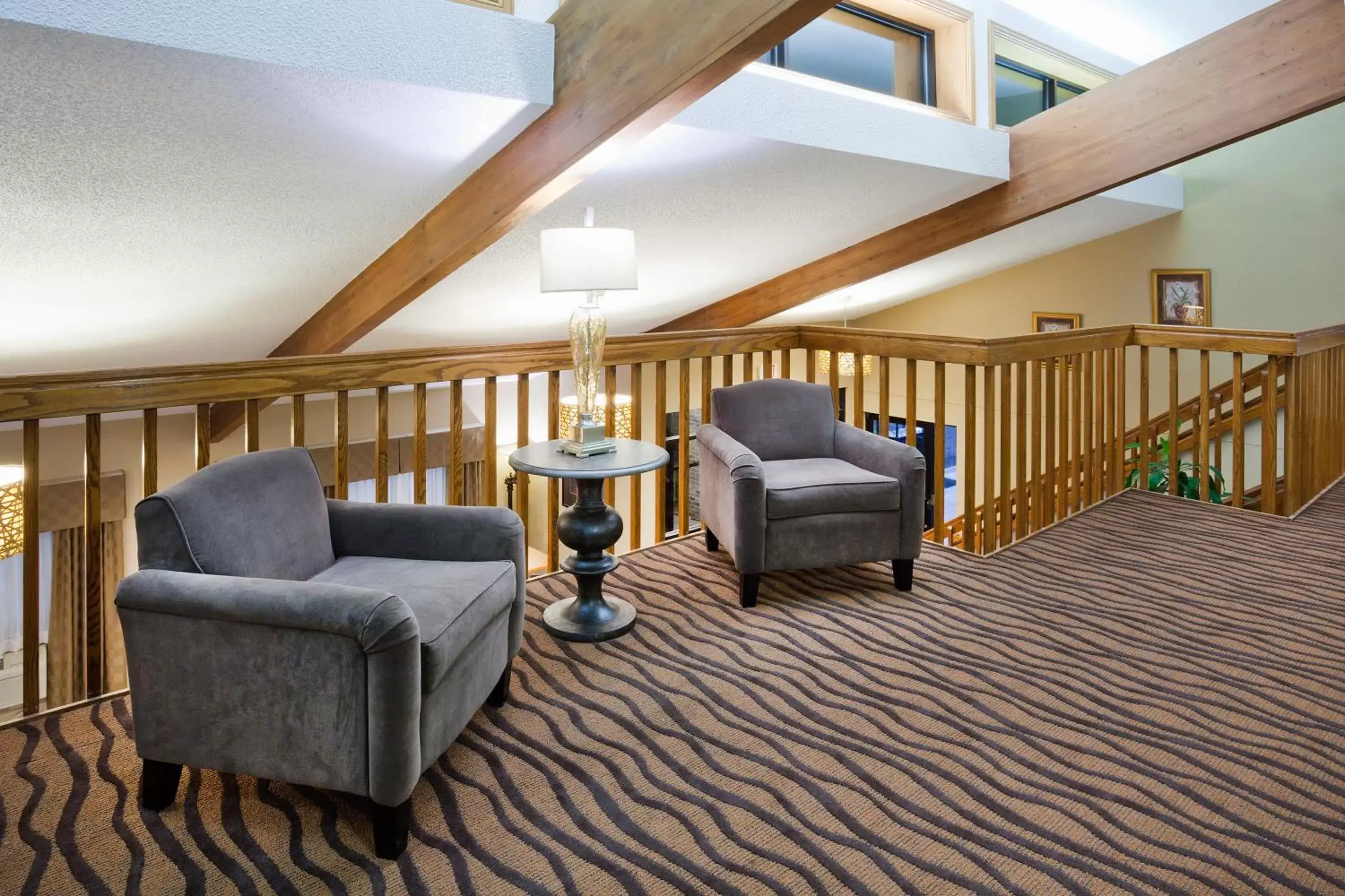 Lobby or reception, Seating Area in AmericInn by Wyndham Plover Stevens Point