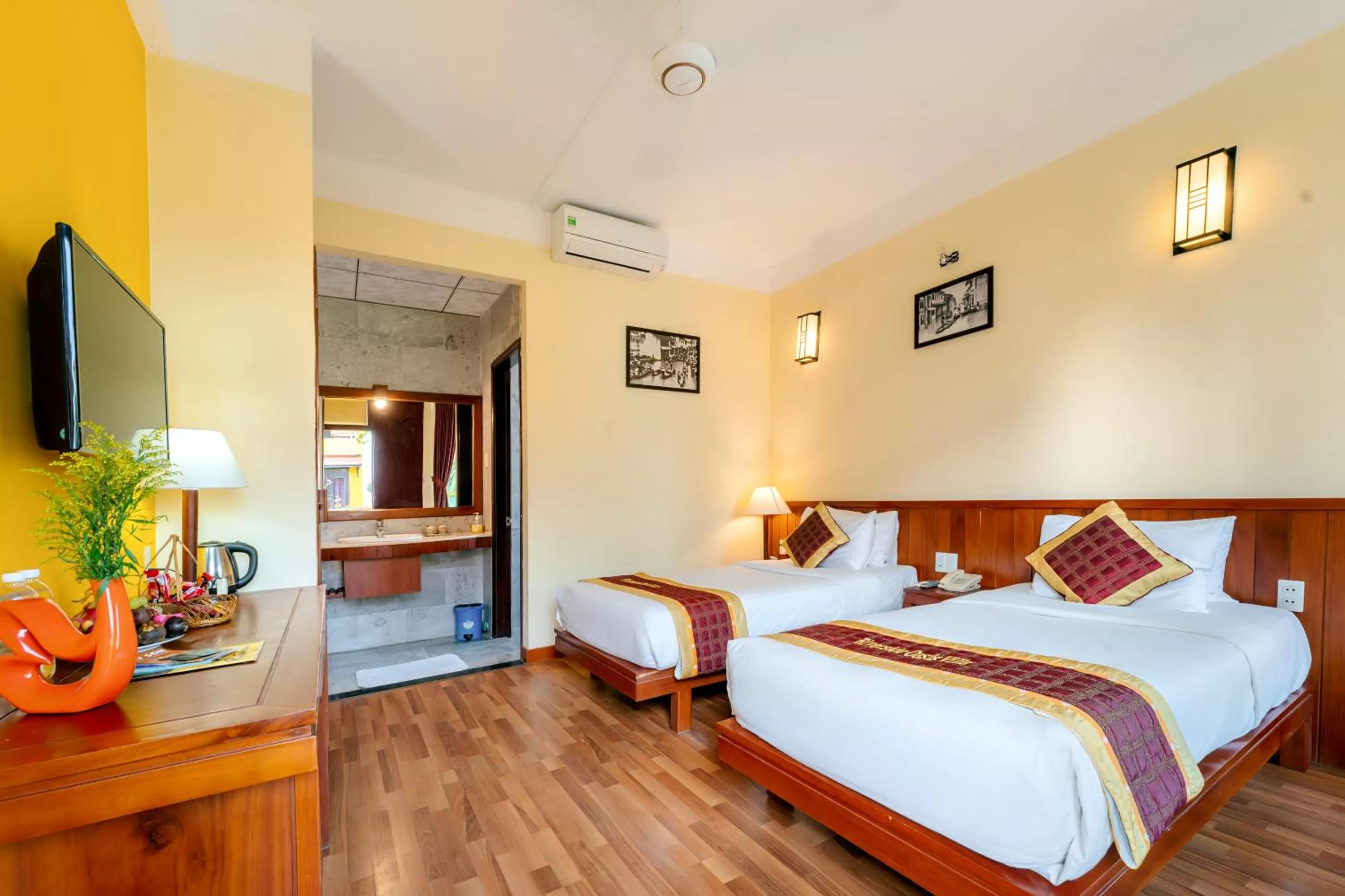 Communal lounge/ TV room, Bed in Hoi An Green Riverside Oasis Villa