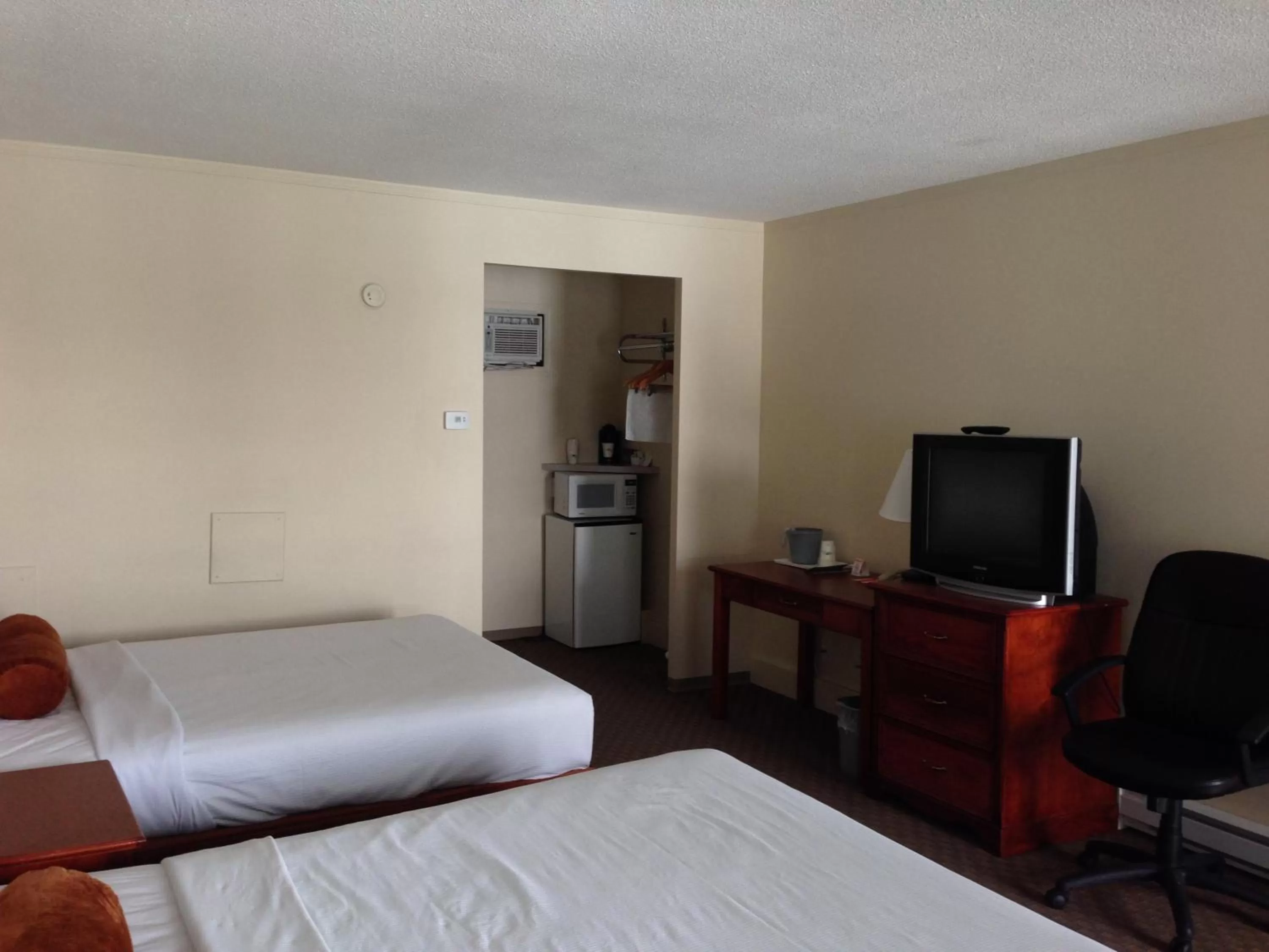 Bed in Knights Inn Lethbridge