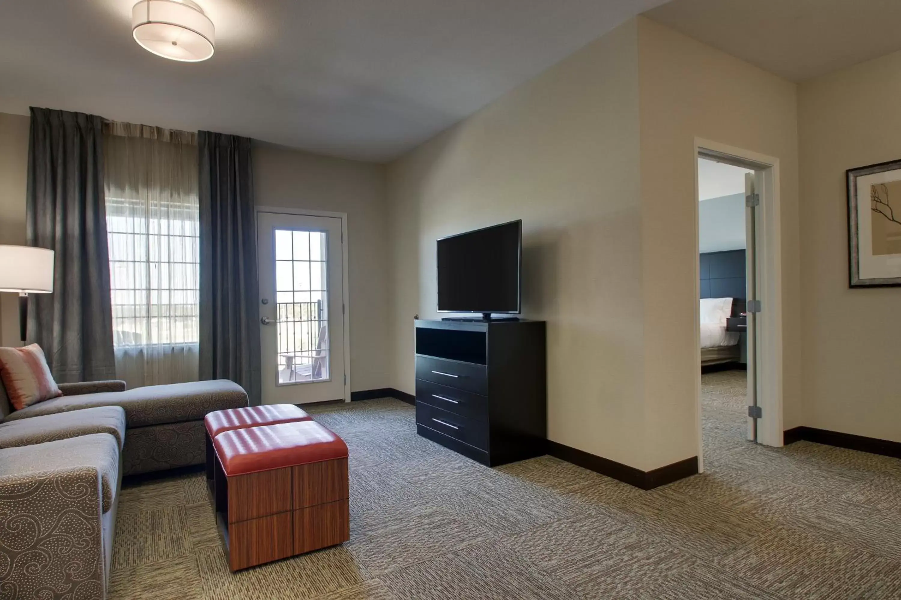 Photo of the whole room, TV/Entertainment Center in Staybridge Suites Plano - The Colony, an IHG Hotel