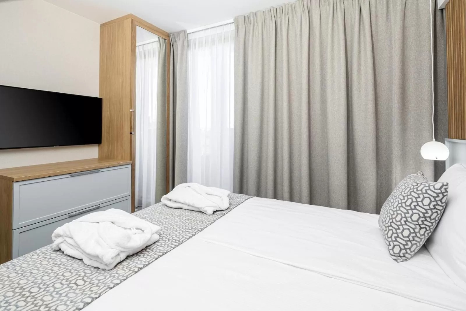 Bed in Maloves Resort & Spa