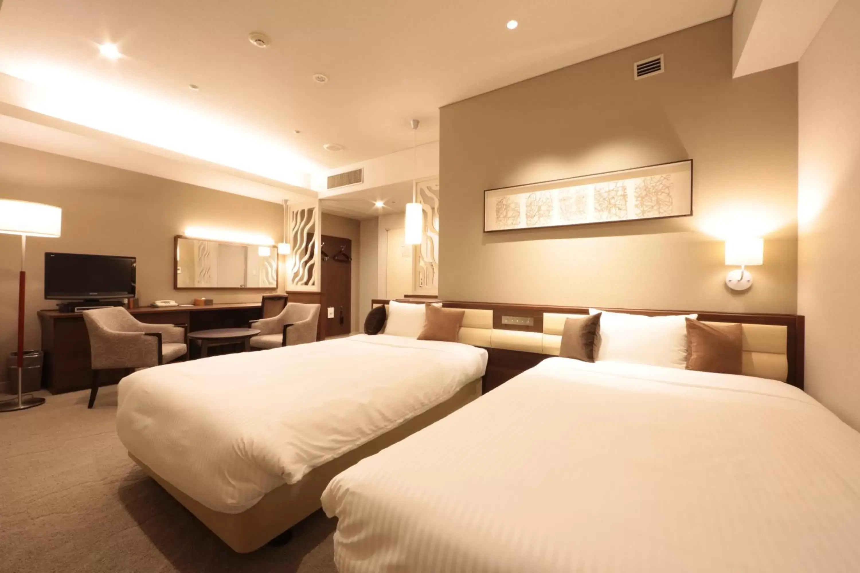 Bed in Hotel Monarque Tottori