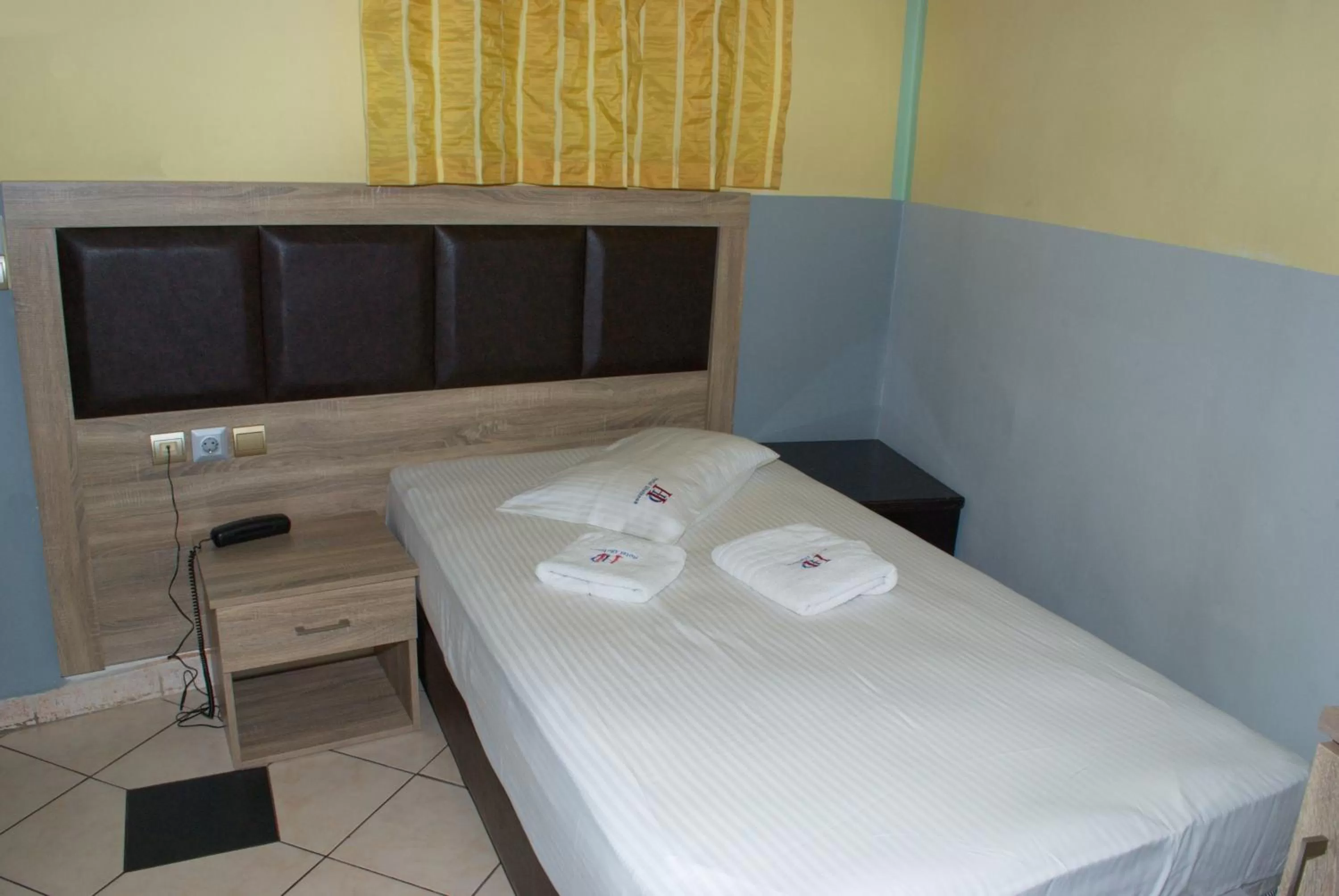 Bed in Diethnes Hotel