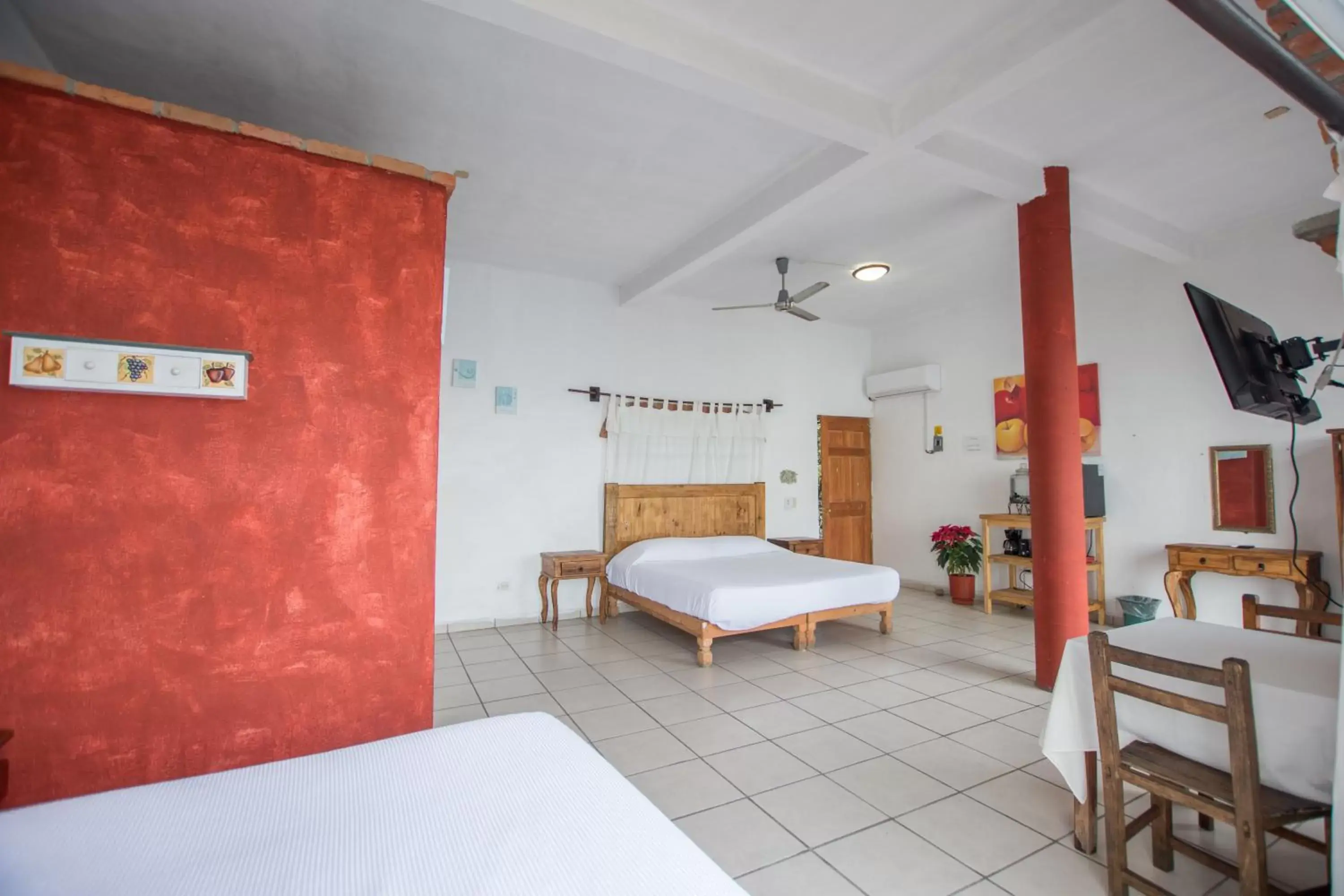 Bed in Traditional Sierra Leon Oceanfront Rooms - Adults Only