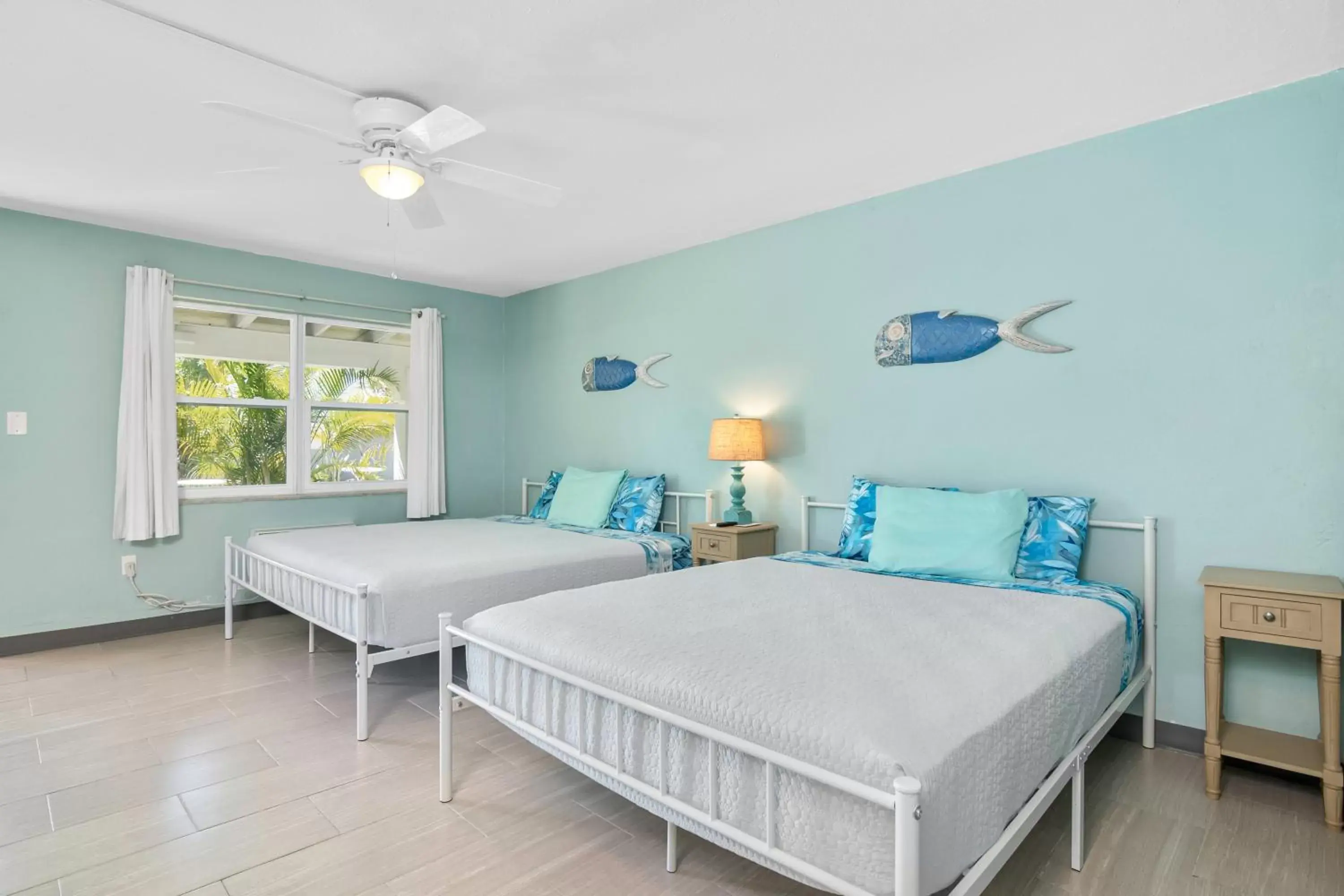 Bedroom, Bed in Latitude 26 Waterfront Boutique Resort - Fort Myers Beach