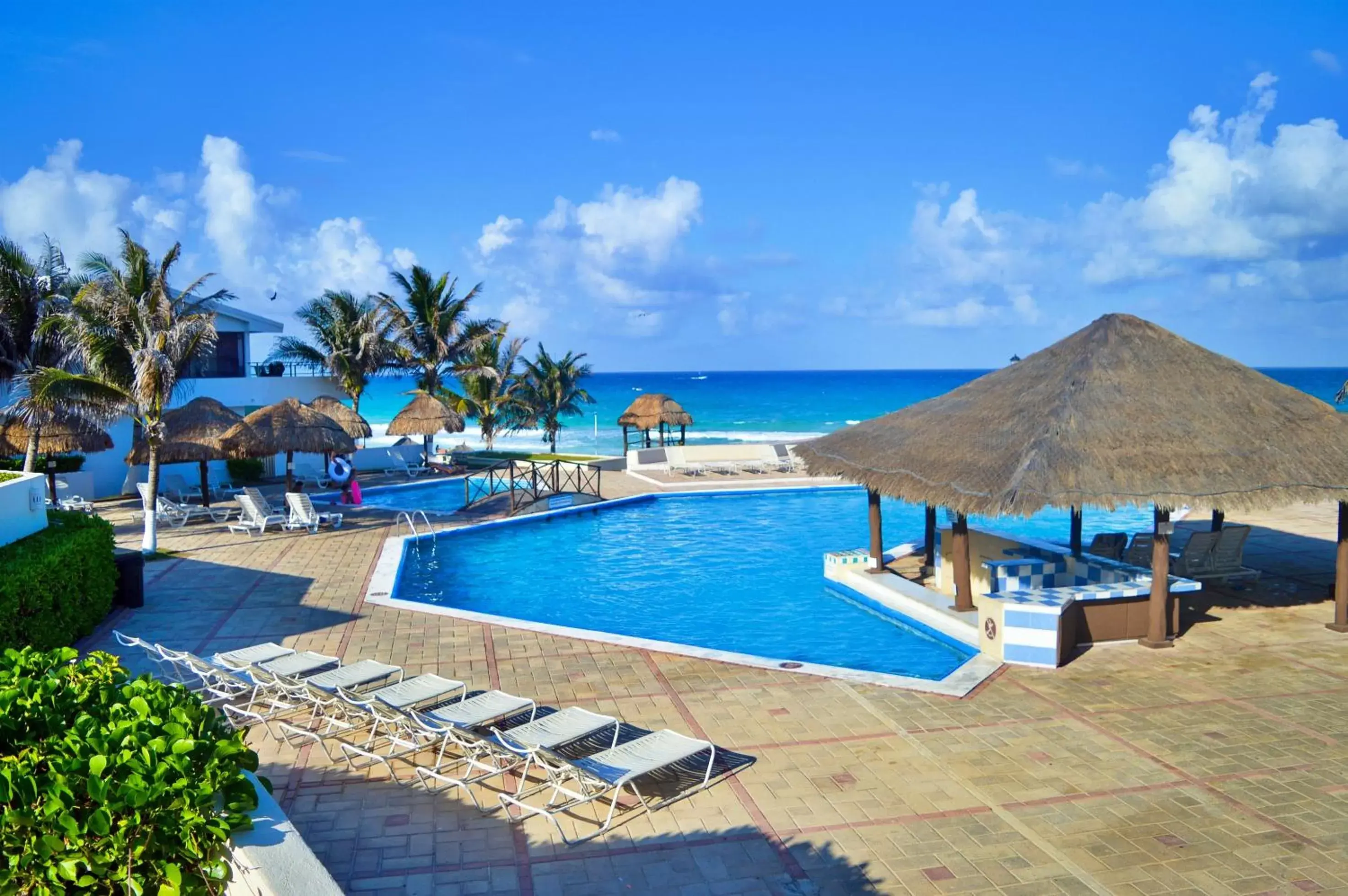 Pool view, Swimming Pool in Beachfront Penthouses by LivIN Cancun