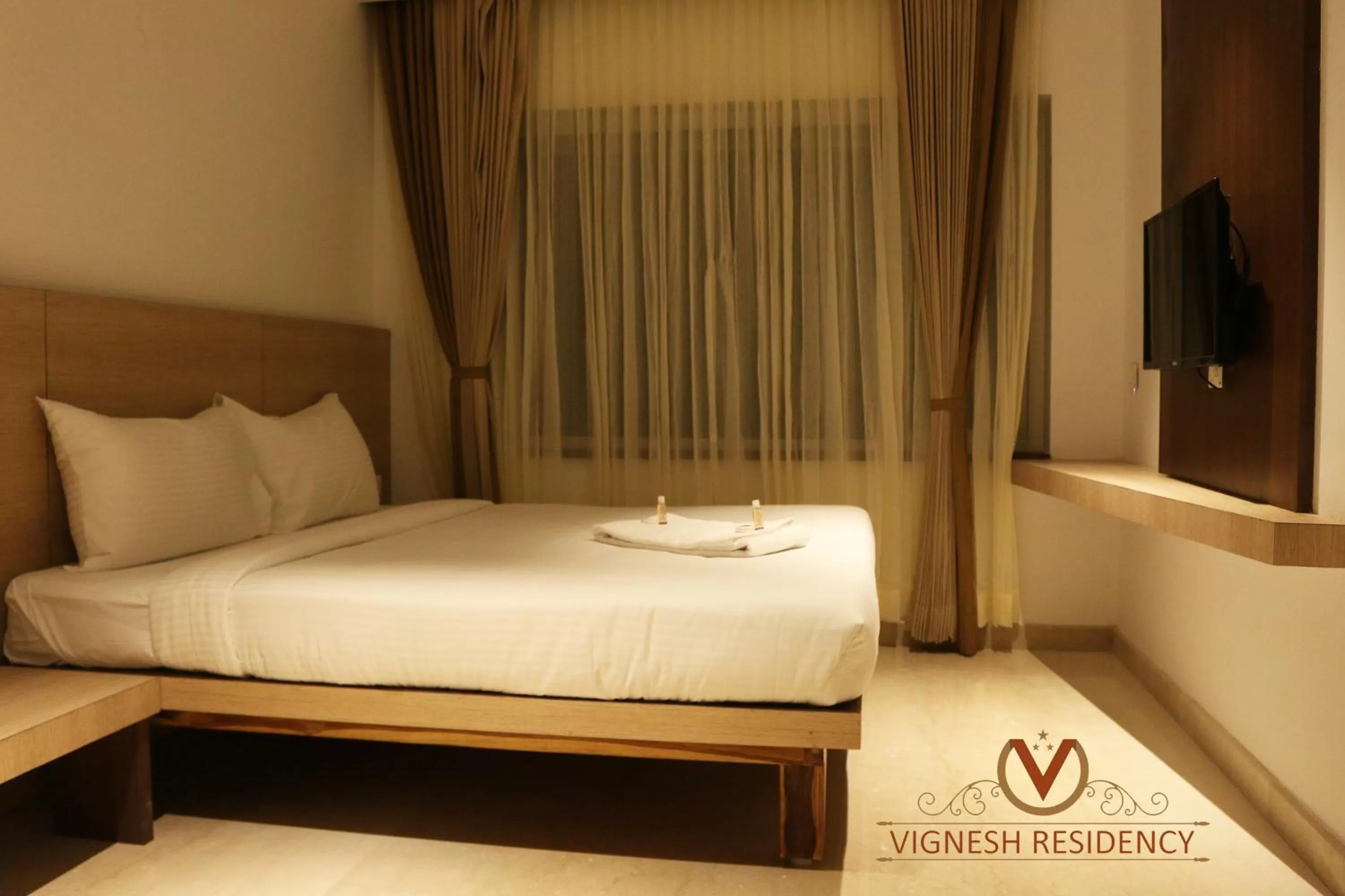 Bed in Vignesh Residency