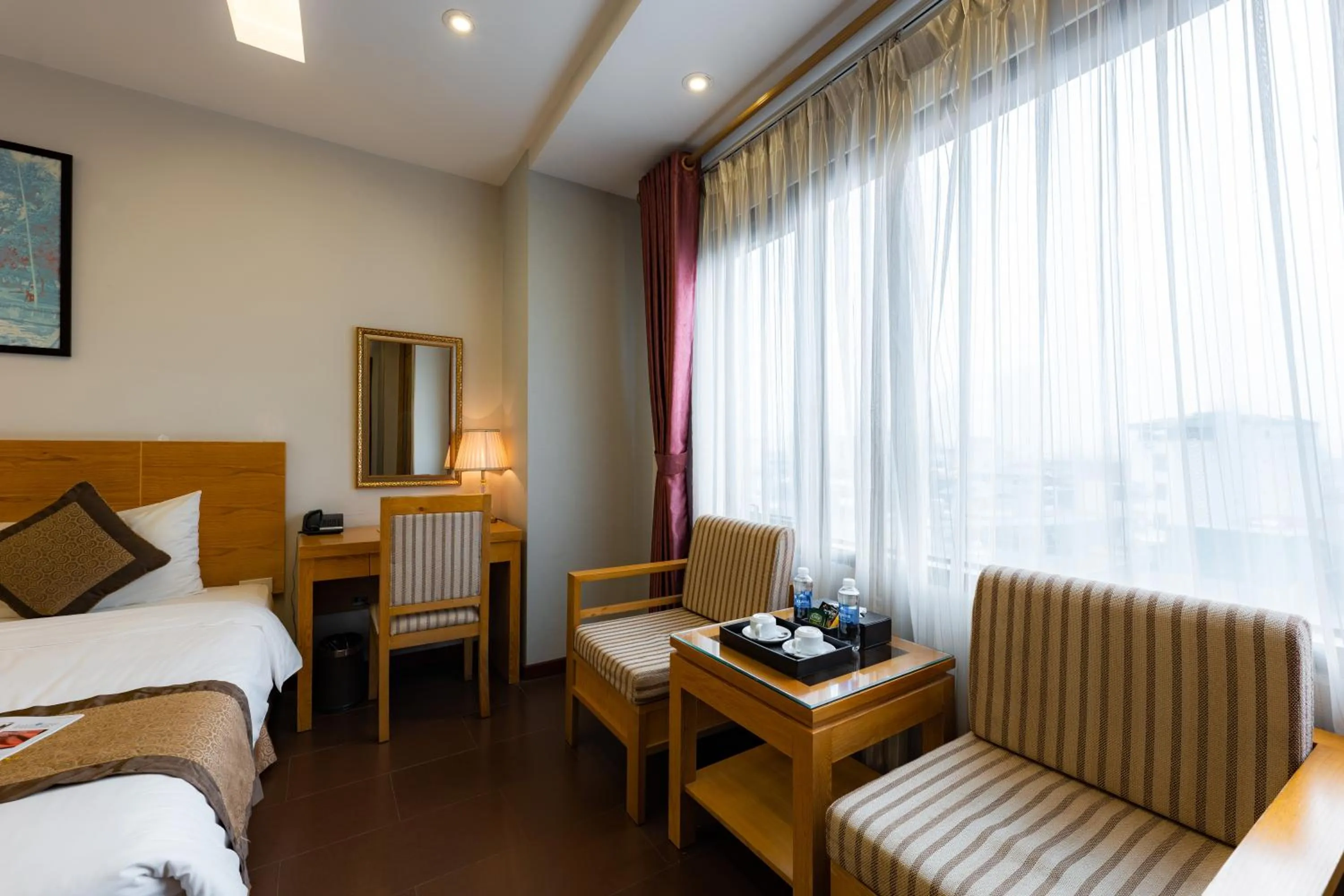 Bed in Riverside Hanoi Hotel