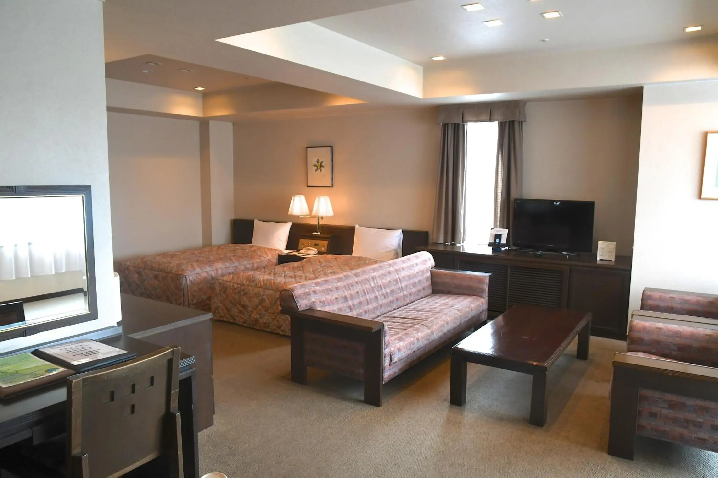 Photo of the whole room, TV/Entertainment Center in Karuizawakurabu Hotel 1130 Hewitt Resort