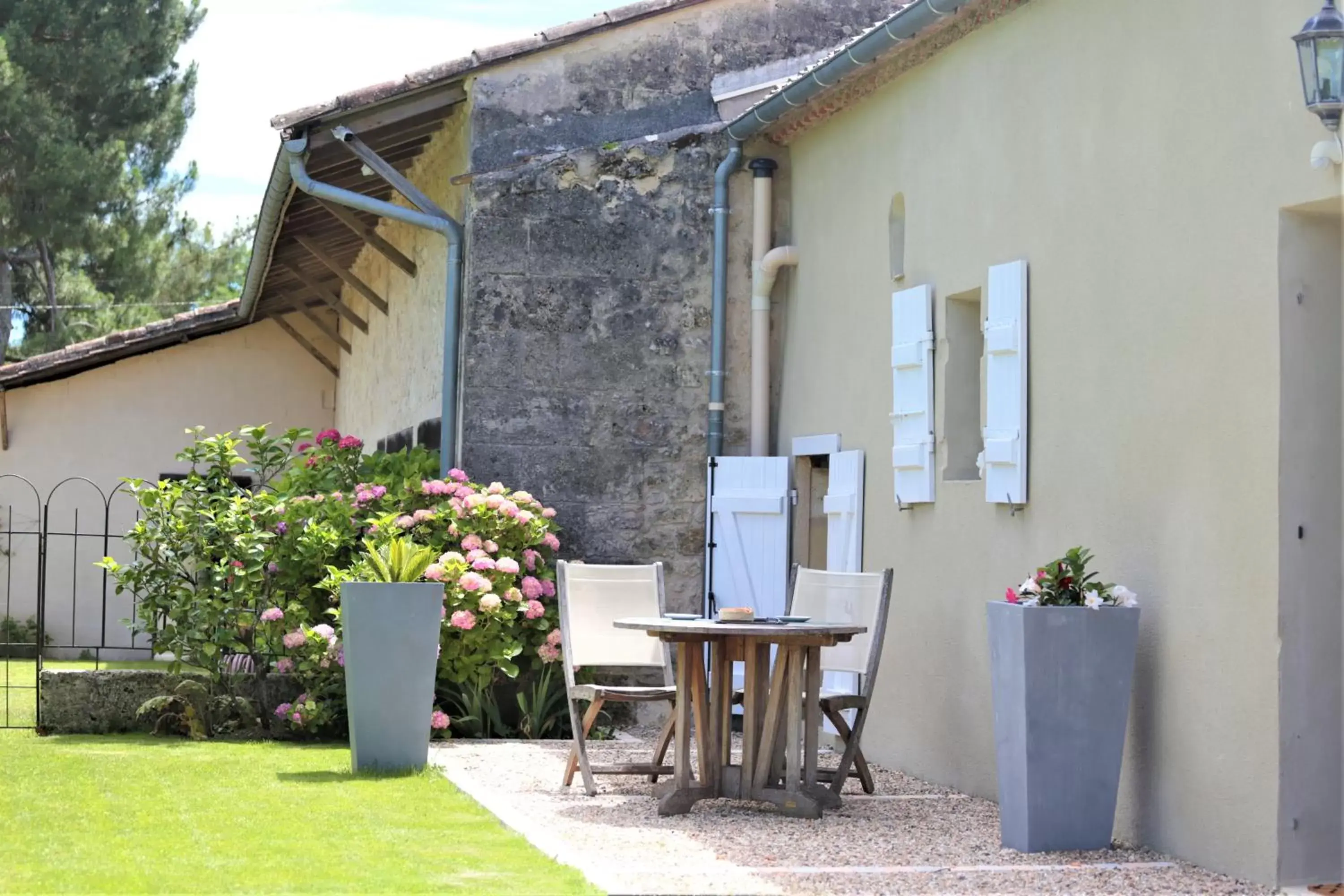 Patio in Au Do'Mayne des Bouilles - Spa & Piscine