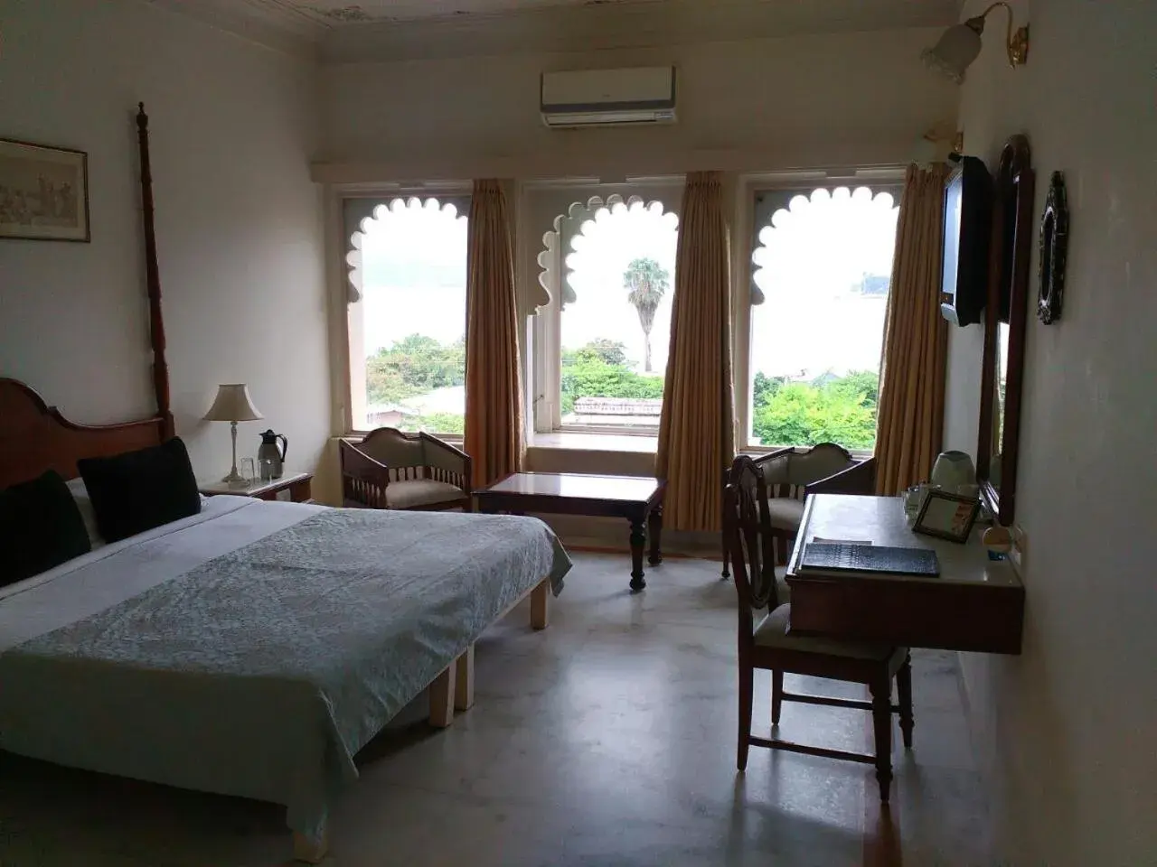 Photo of the whole room, Bed in Rampratap Palace by Fateh Collection Photo of the whole room, Bed in Rampratap Palace by Fateh Collection