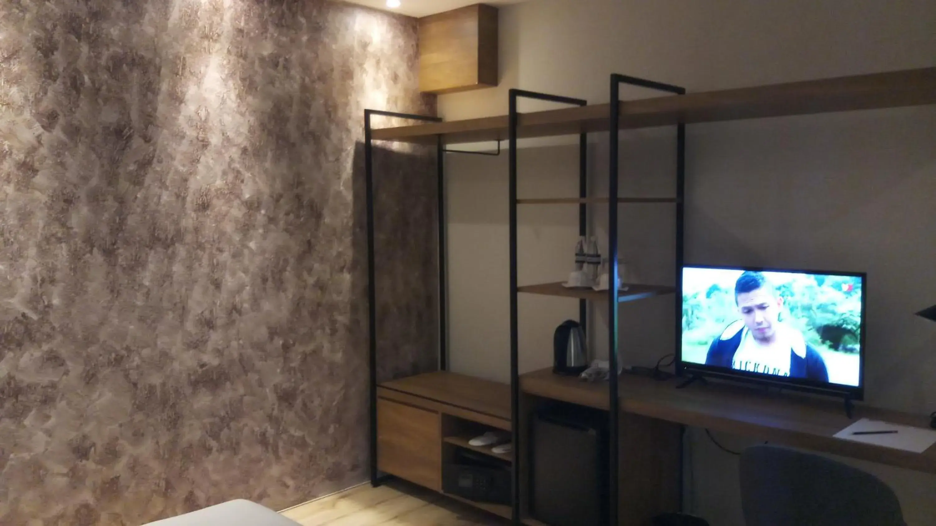 TV and multimedia, TV/Entertainment Center in Roxy Hotel Padungan