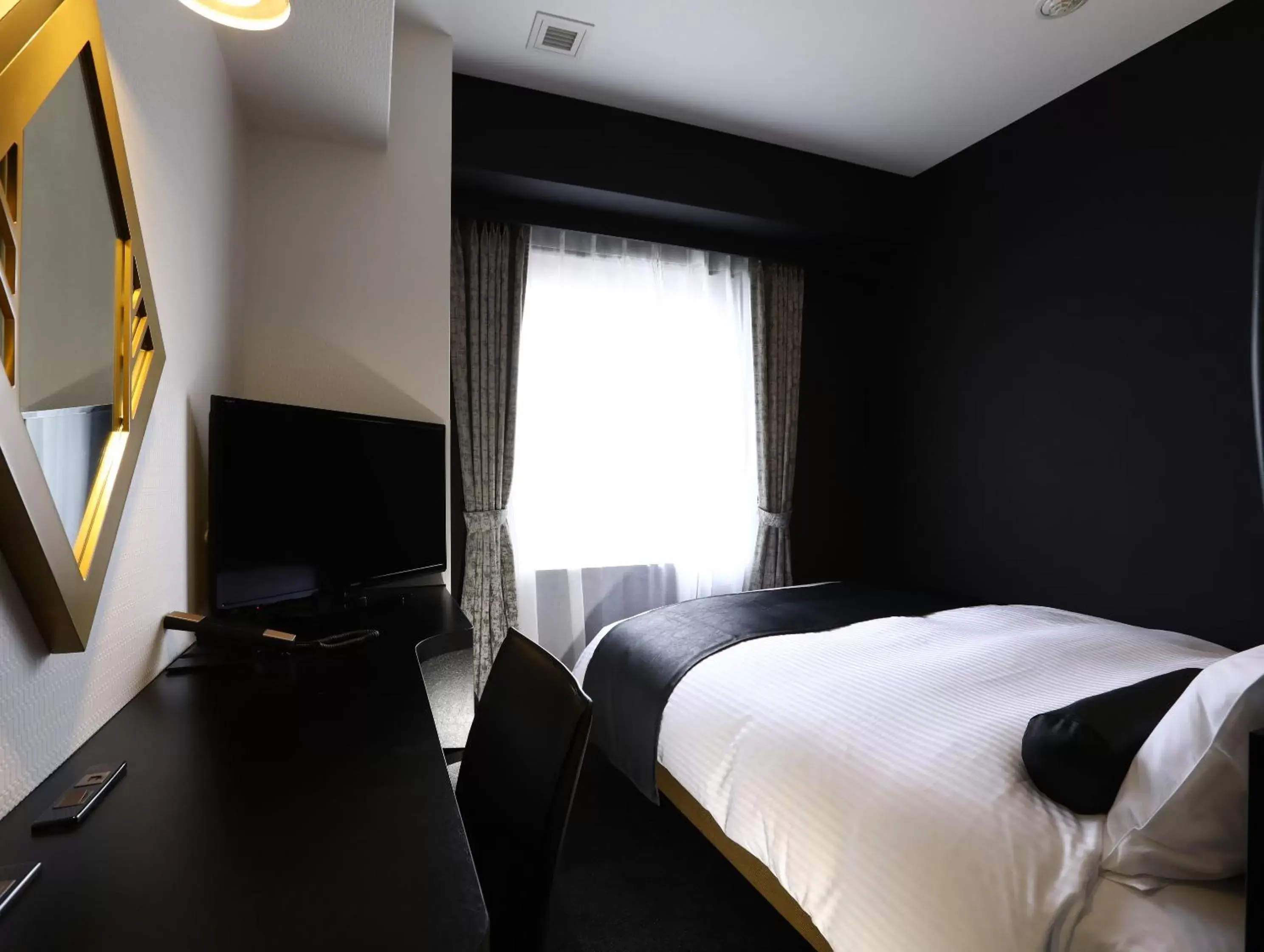 Bed in Hotel Wing International Select Osaka Umeda