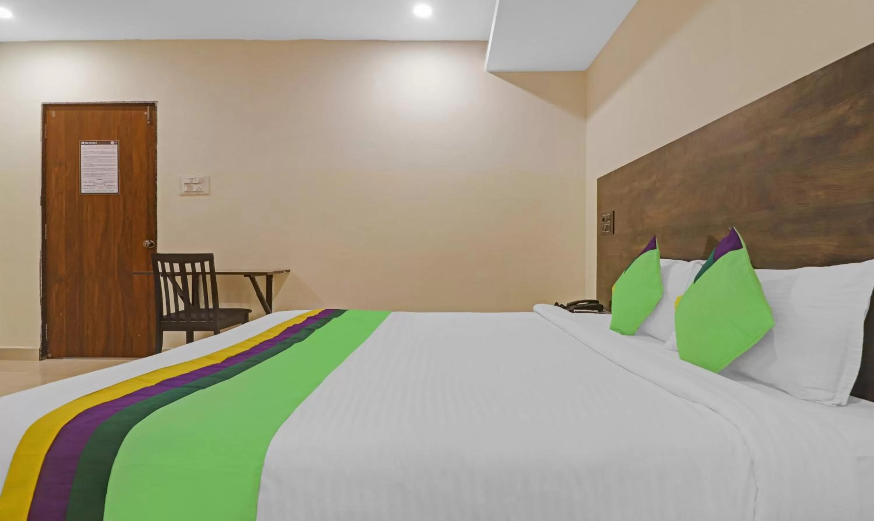 Bedroom, Bed in Treebo Tee