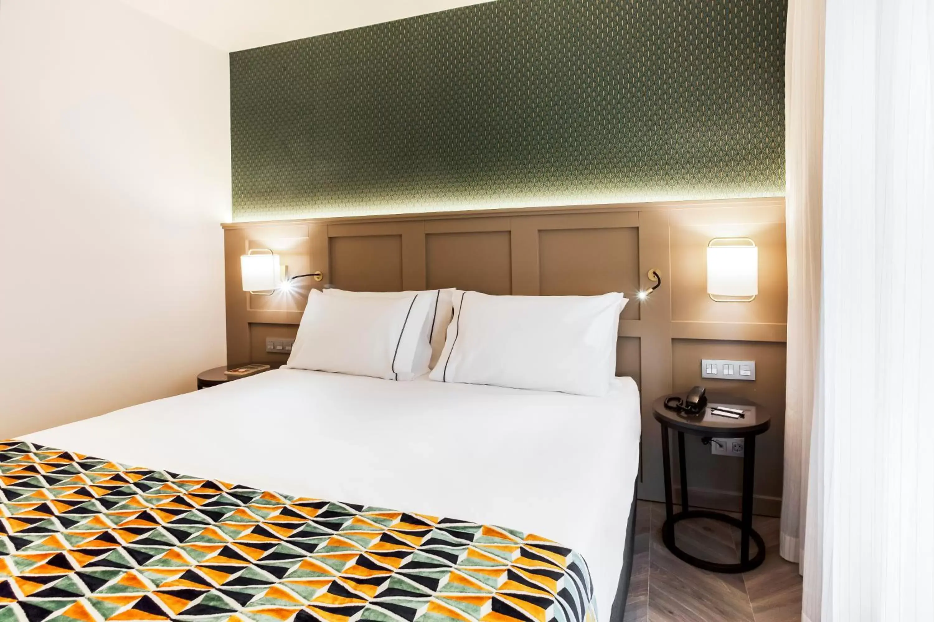 Photo of the whole room, Bed in Eurostars Puerta Real