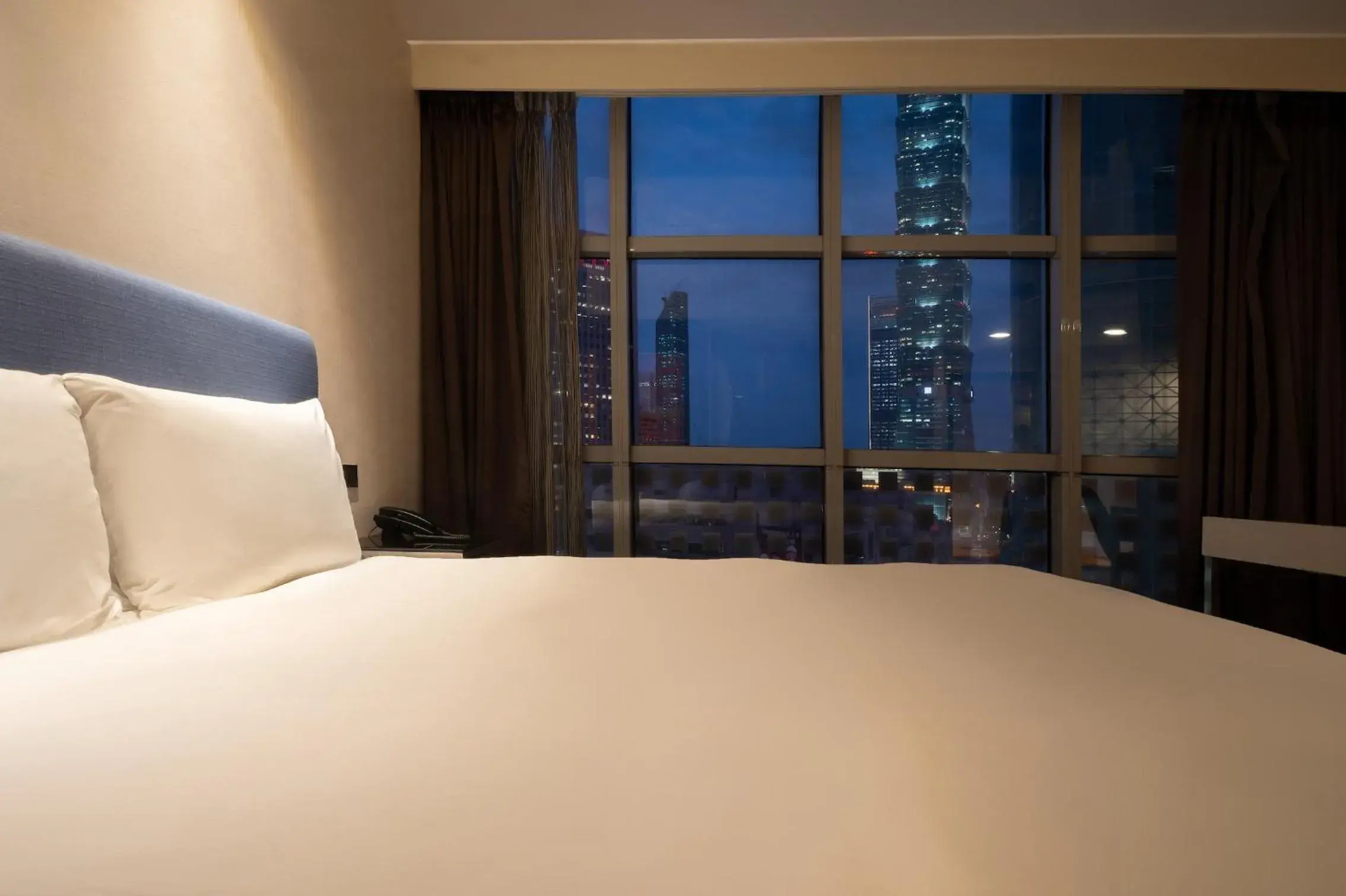 Bed in CHECK inn Taipei Xinyi (Quarantine Hotel)