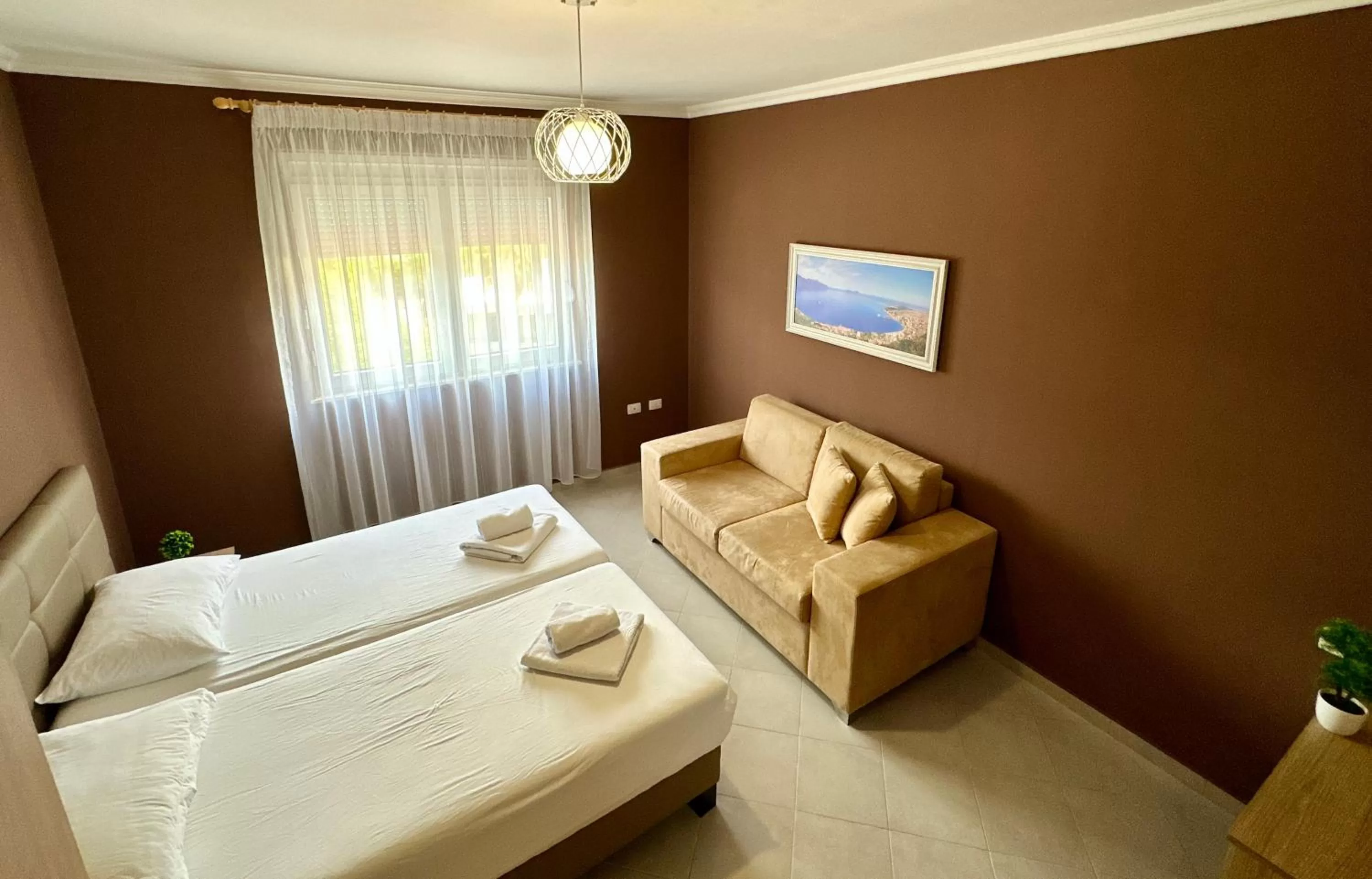 Bed in FAMILY SUITE RESIDENCE