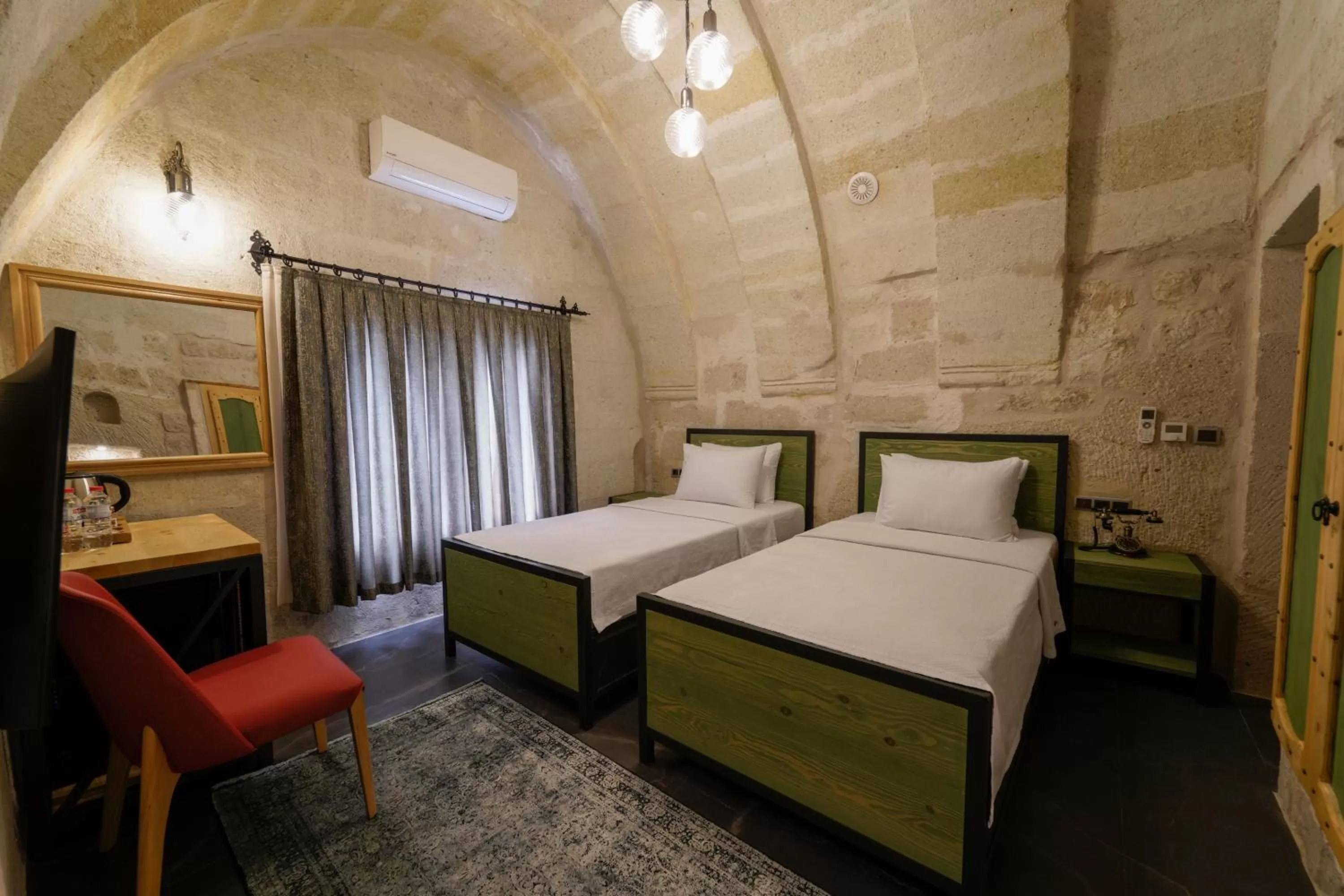 Bed in The Niche Cave Hotel