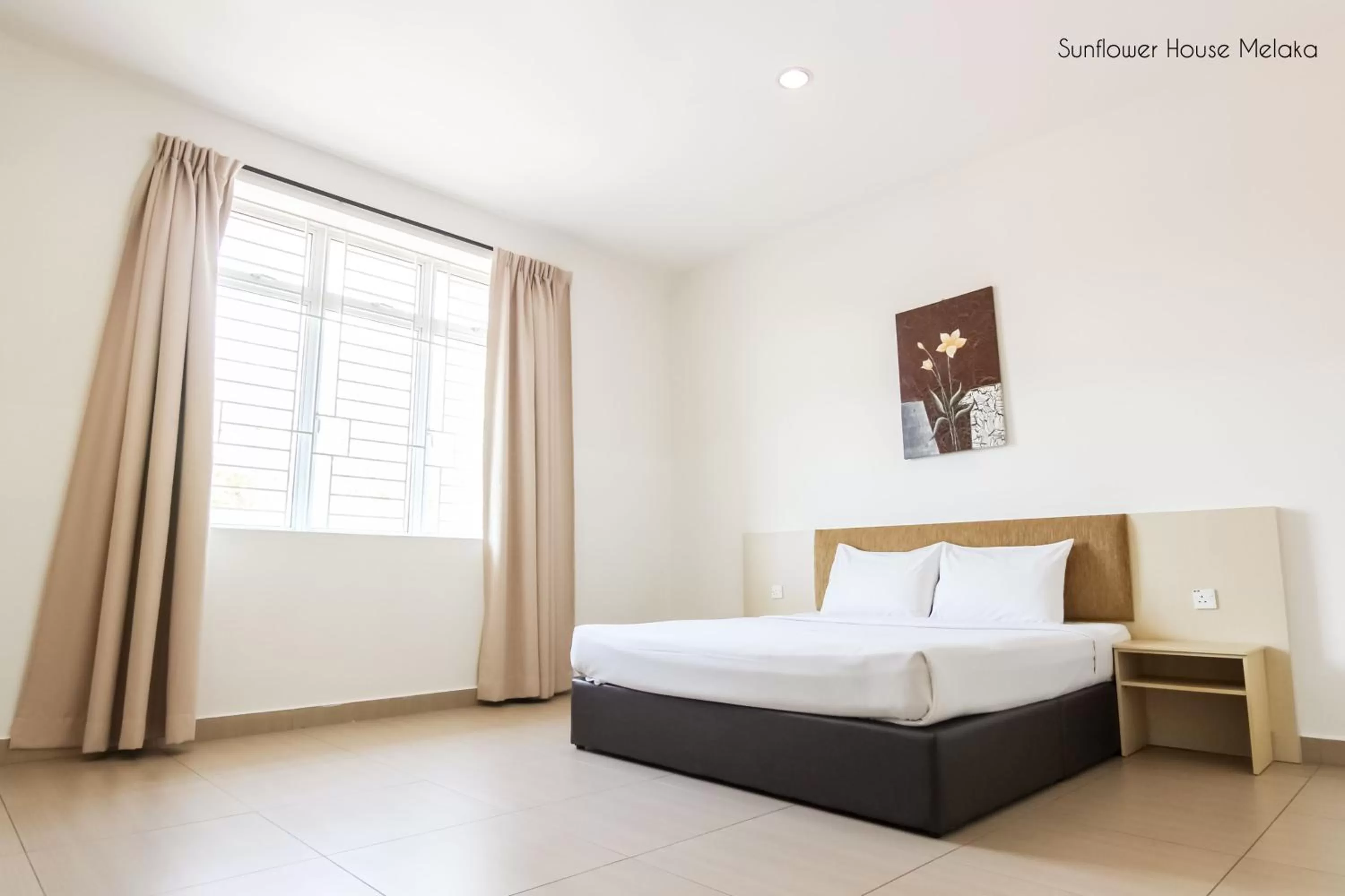 Bed in Sunflower Hotel Malacca