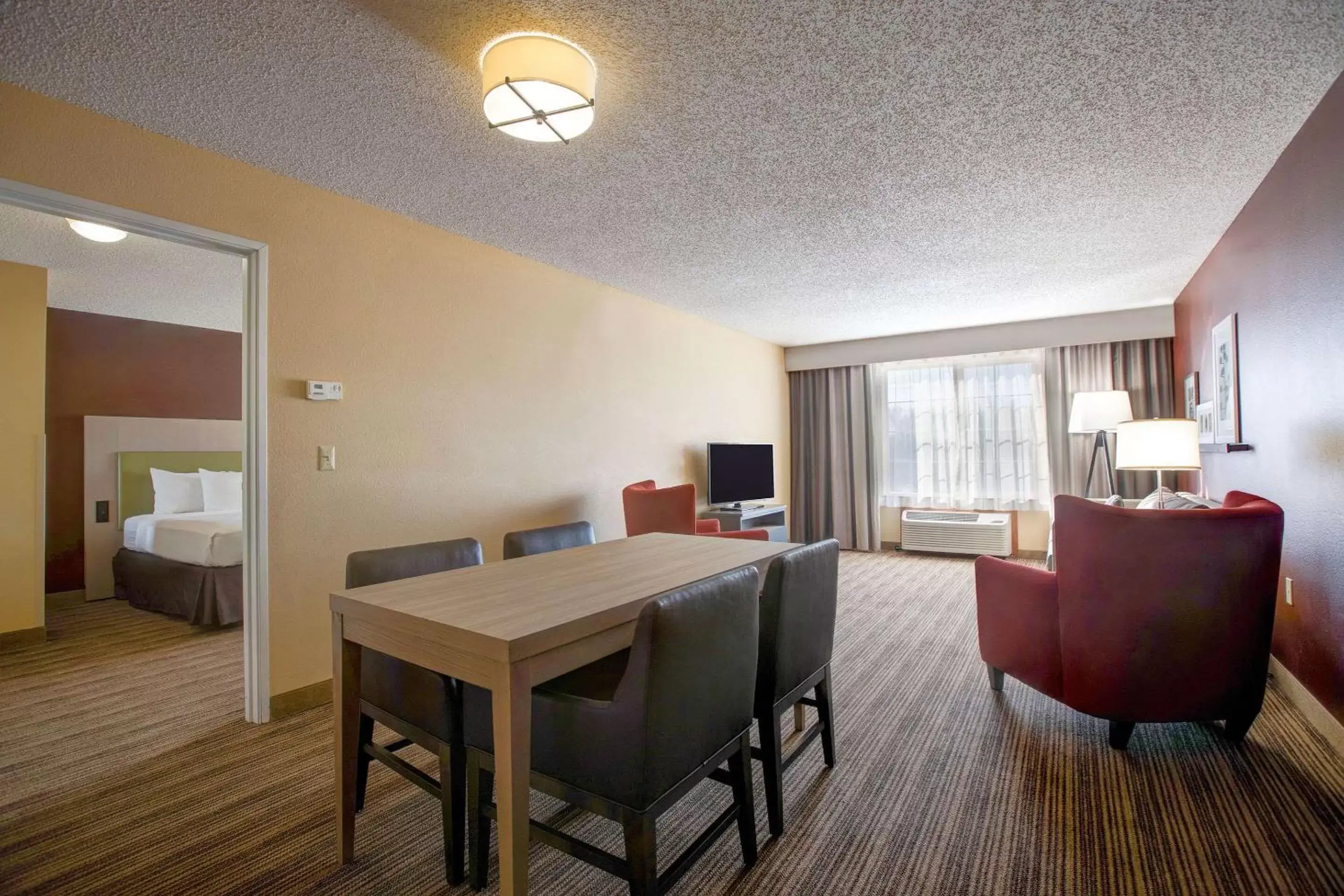 Bedroom, Dining Area in Comfort Inn & Suites St. Paul Northeast