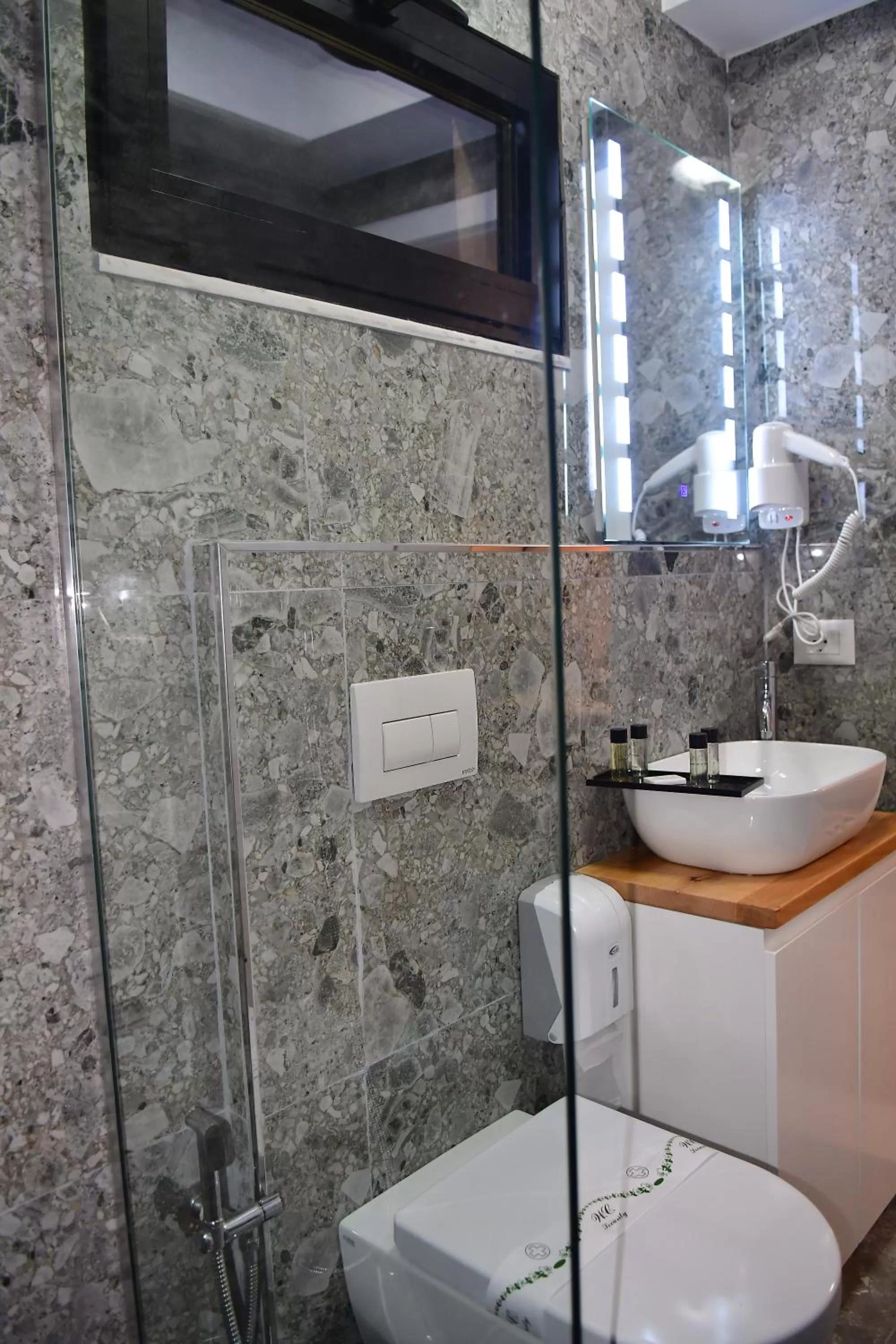 Bathroom in 313 Villa City Center Hotel