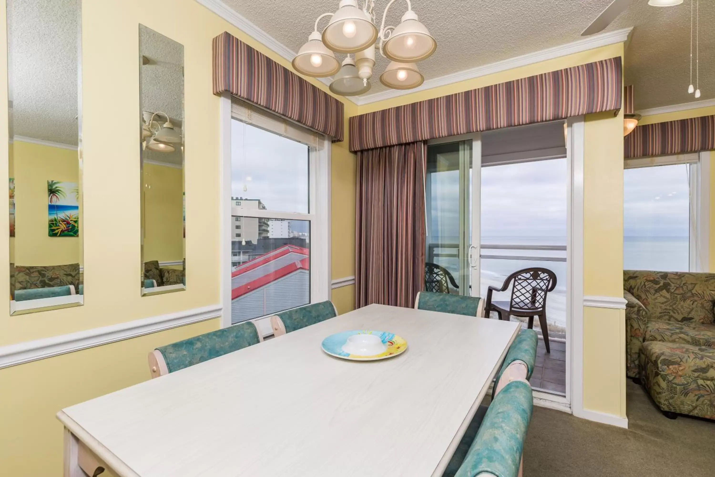 Dining area in A Place at the Beach by Capital Vacations