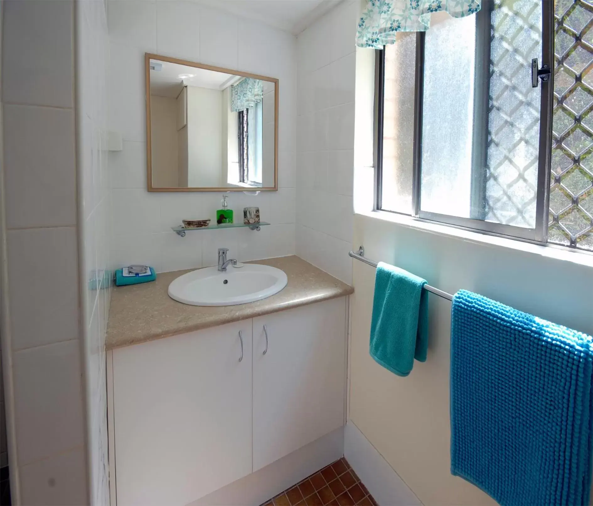 Bathroom in Marcel Towers Holiday Apartments