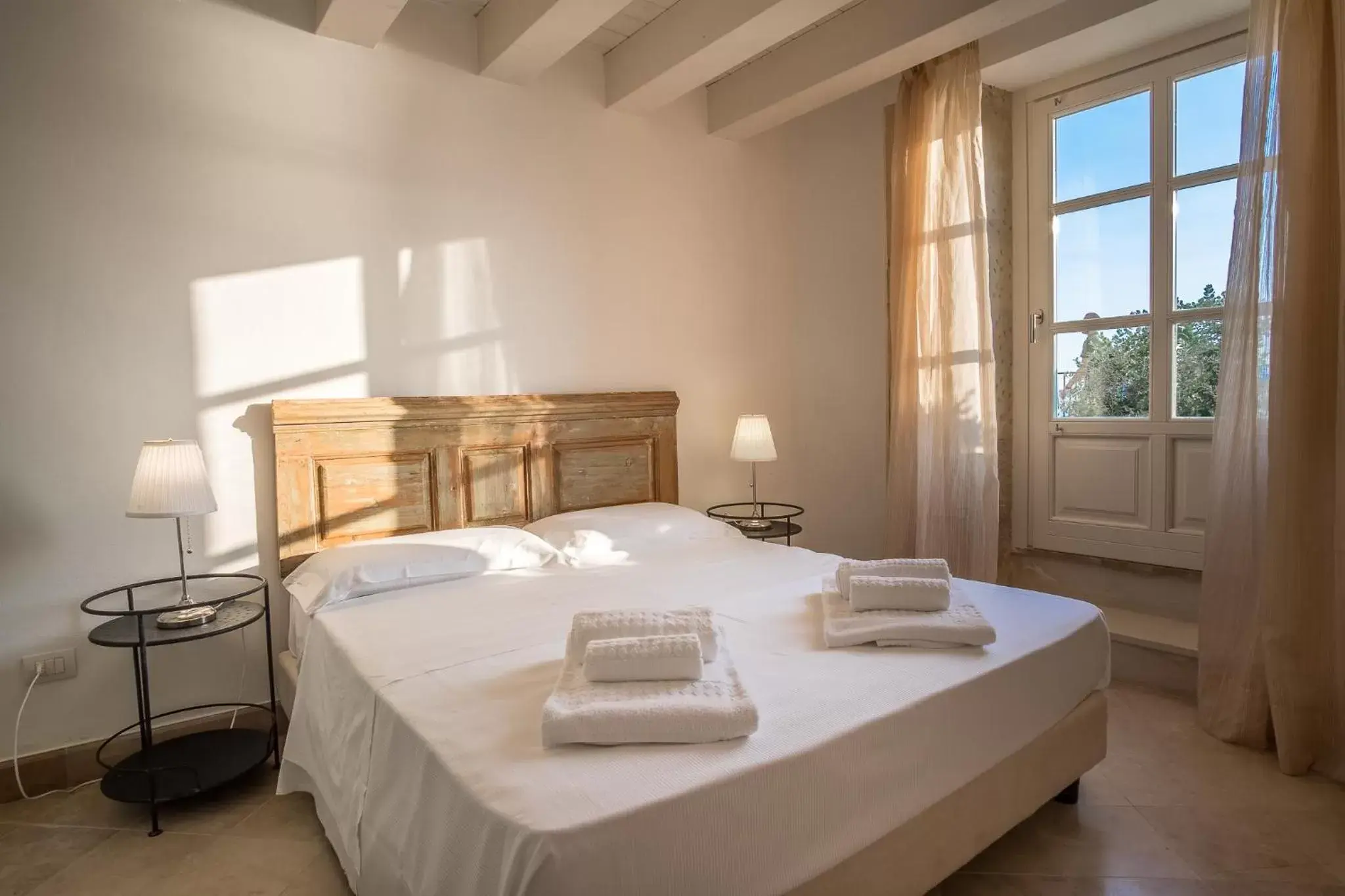 Bed in Palazzo Alfeo Aparthotel