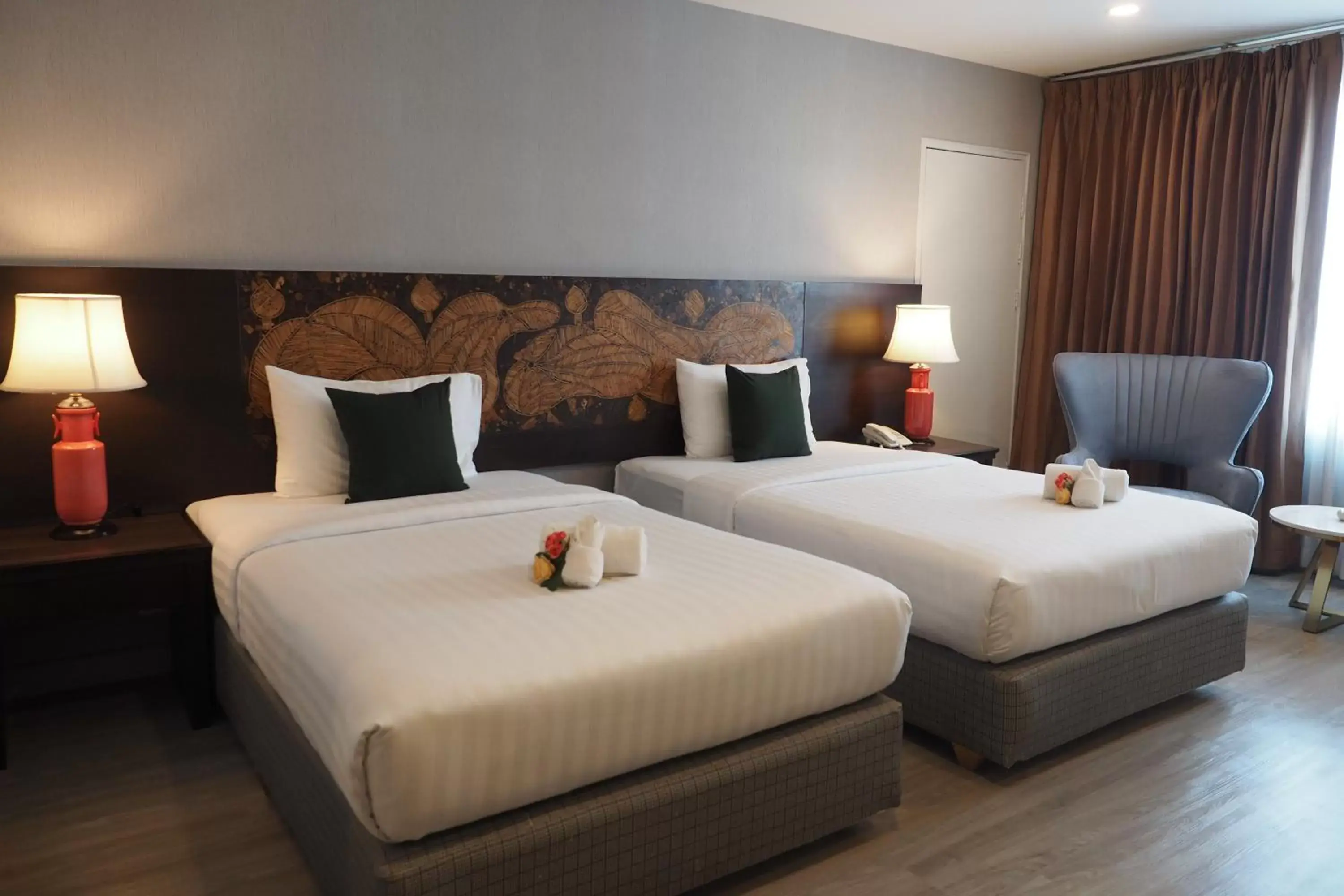 Bed in Empress Pattaya Hotel