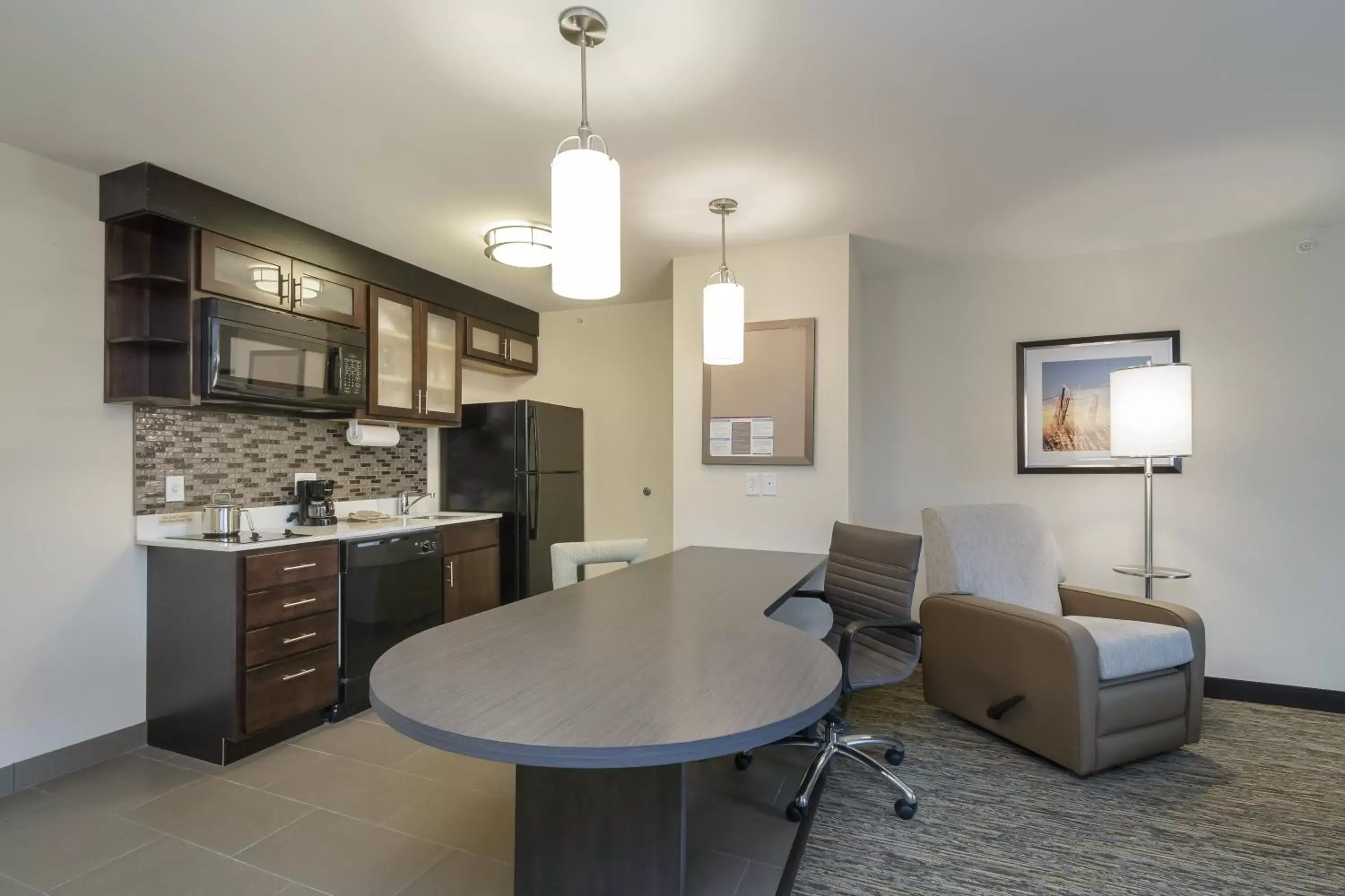 Photo of the whole room, Kitchen/Kitchenette in Candlewood Suites Mishawaka, an IHG Hotel