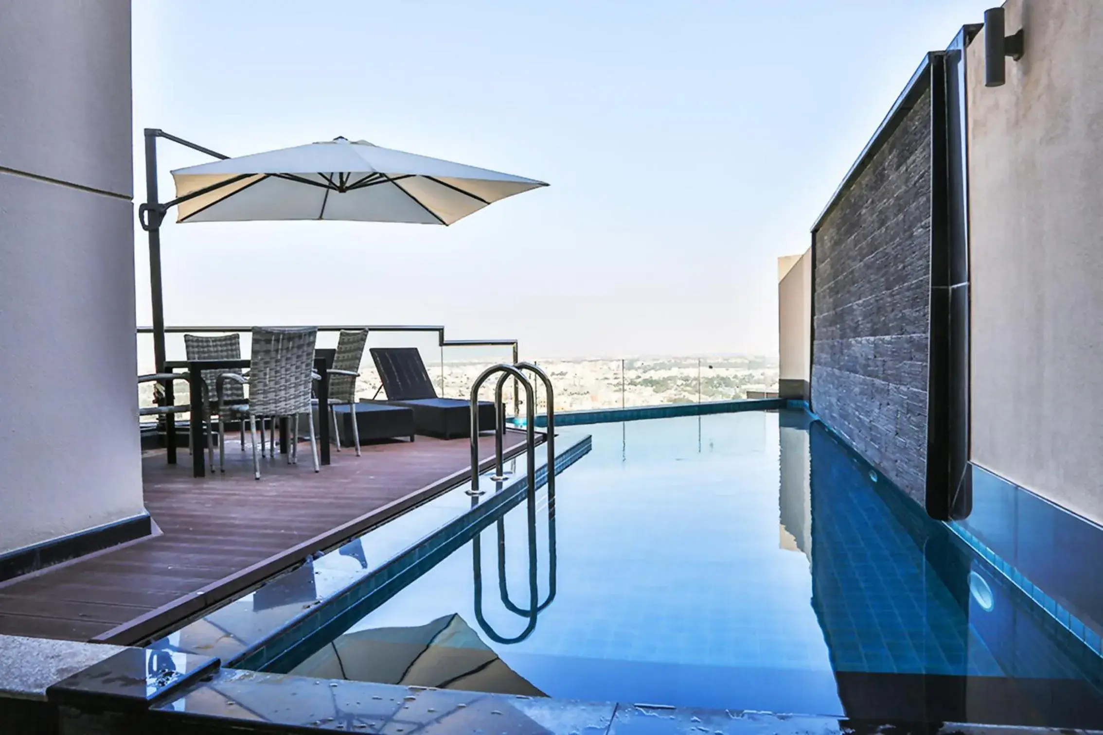 Balcony/Terrace, Swimming Pool in Lagoona Beach Luxury Resort And Spa