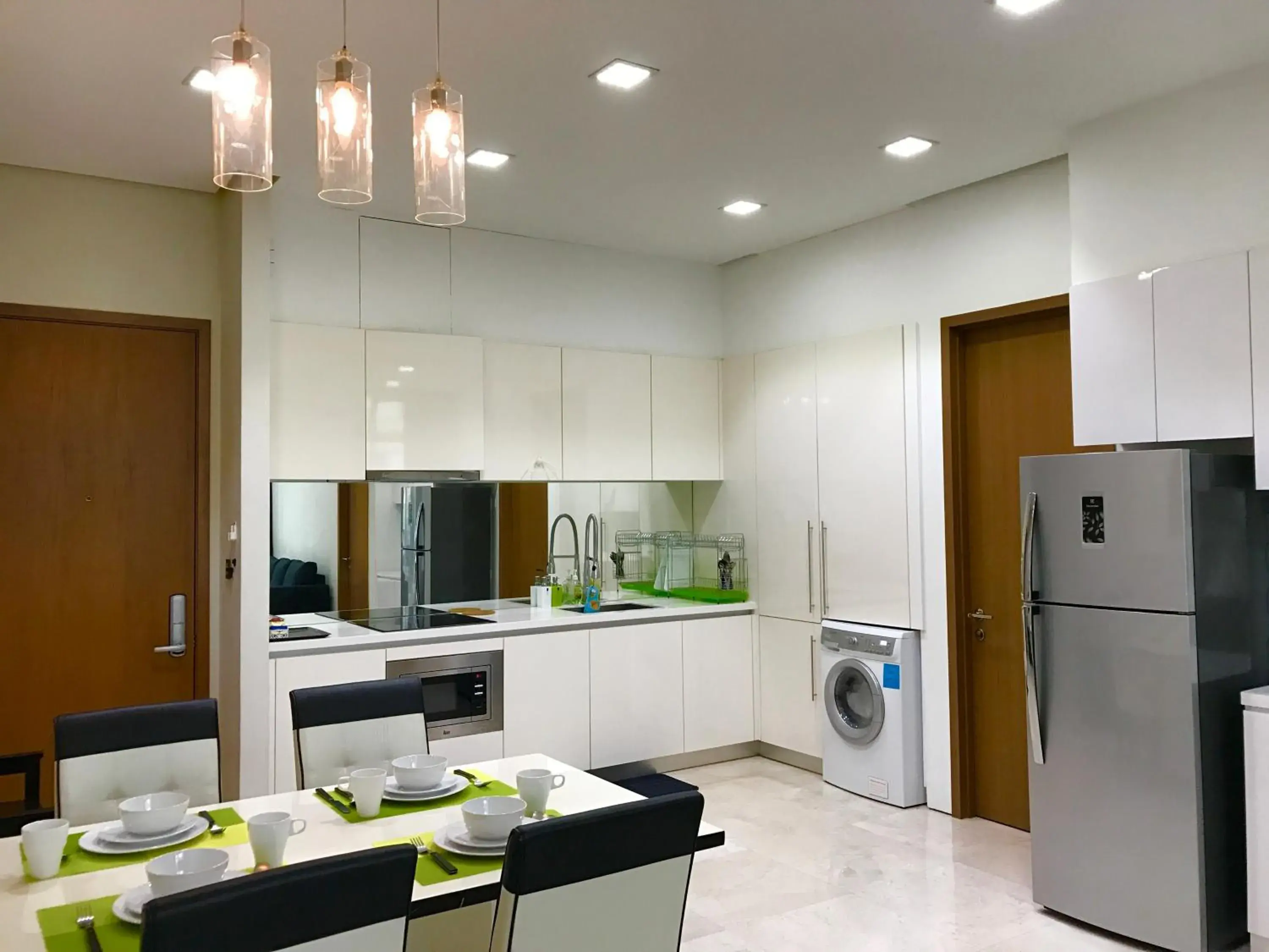 Kitchen/Kitchenette in Soho Suites KLCC by the Betty Roux