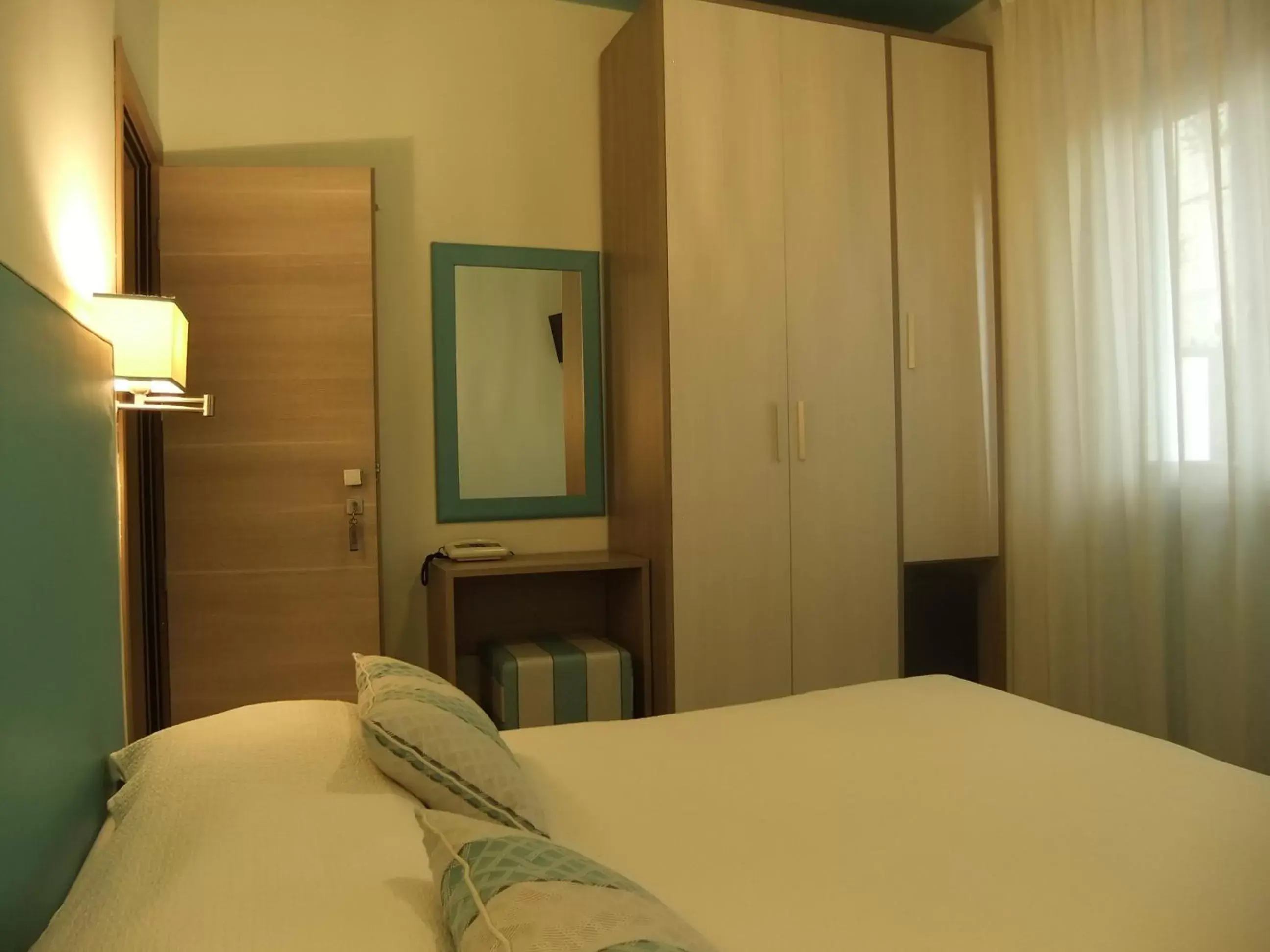 Bed in Hotel Giulio Cesare