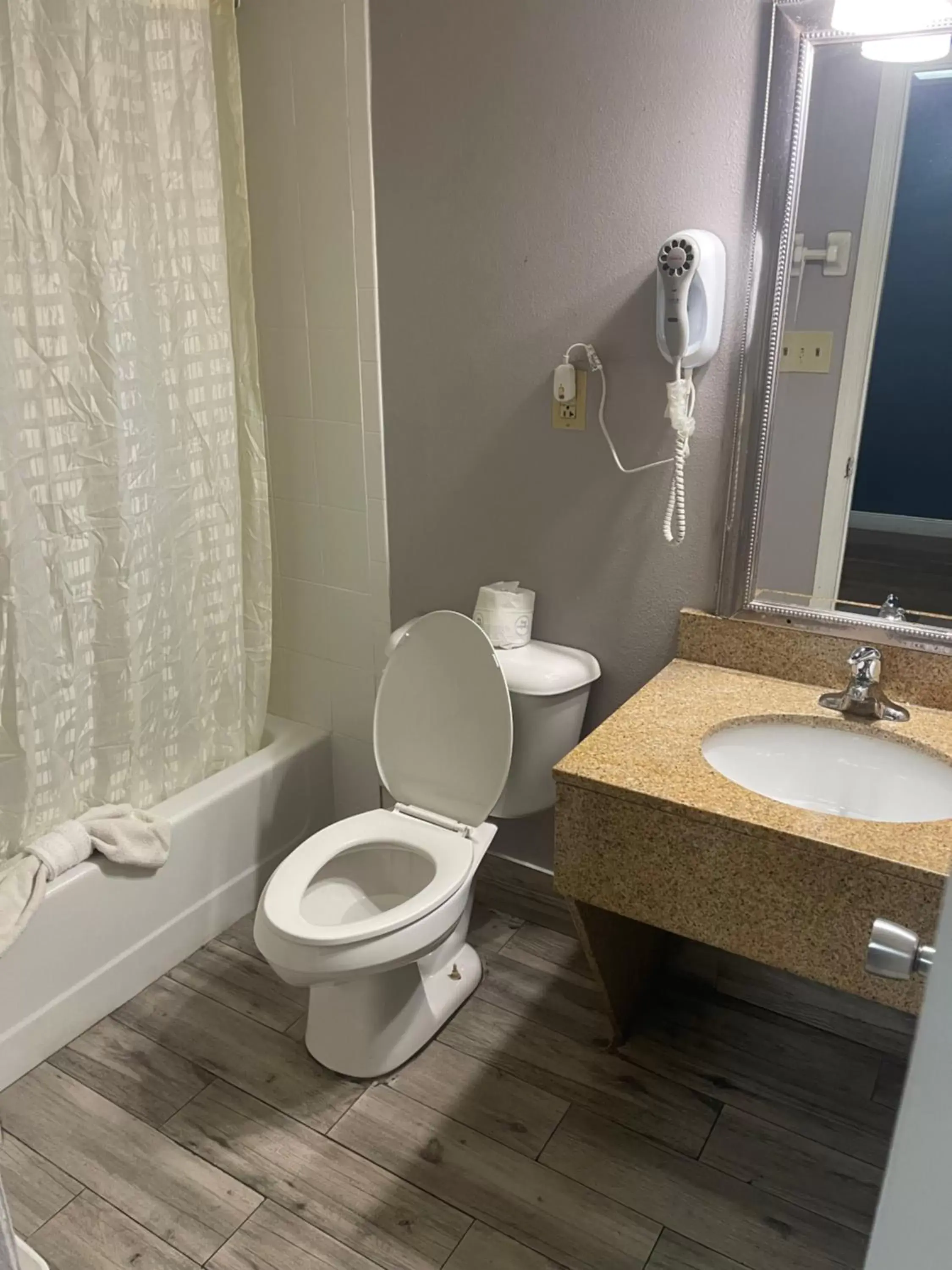 Bathroom in Days Inn by Wyndham Orange City/Deland